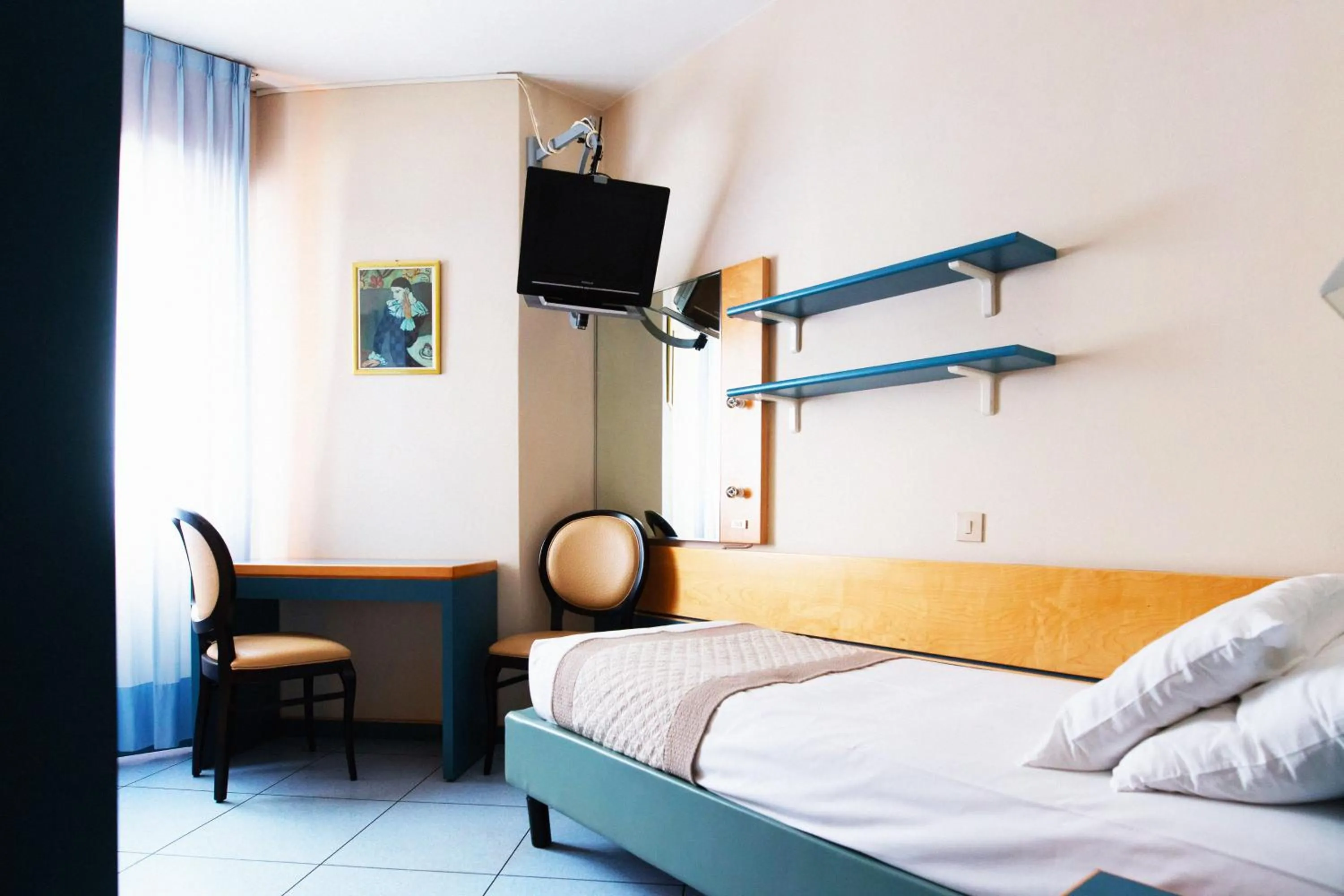 Bed in Hotel Monaco & Quisisana