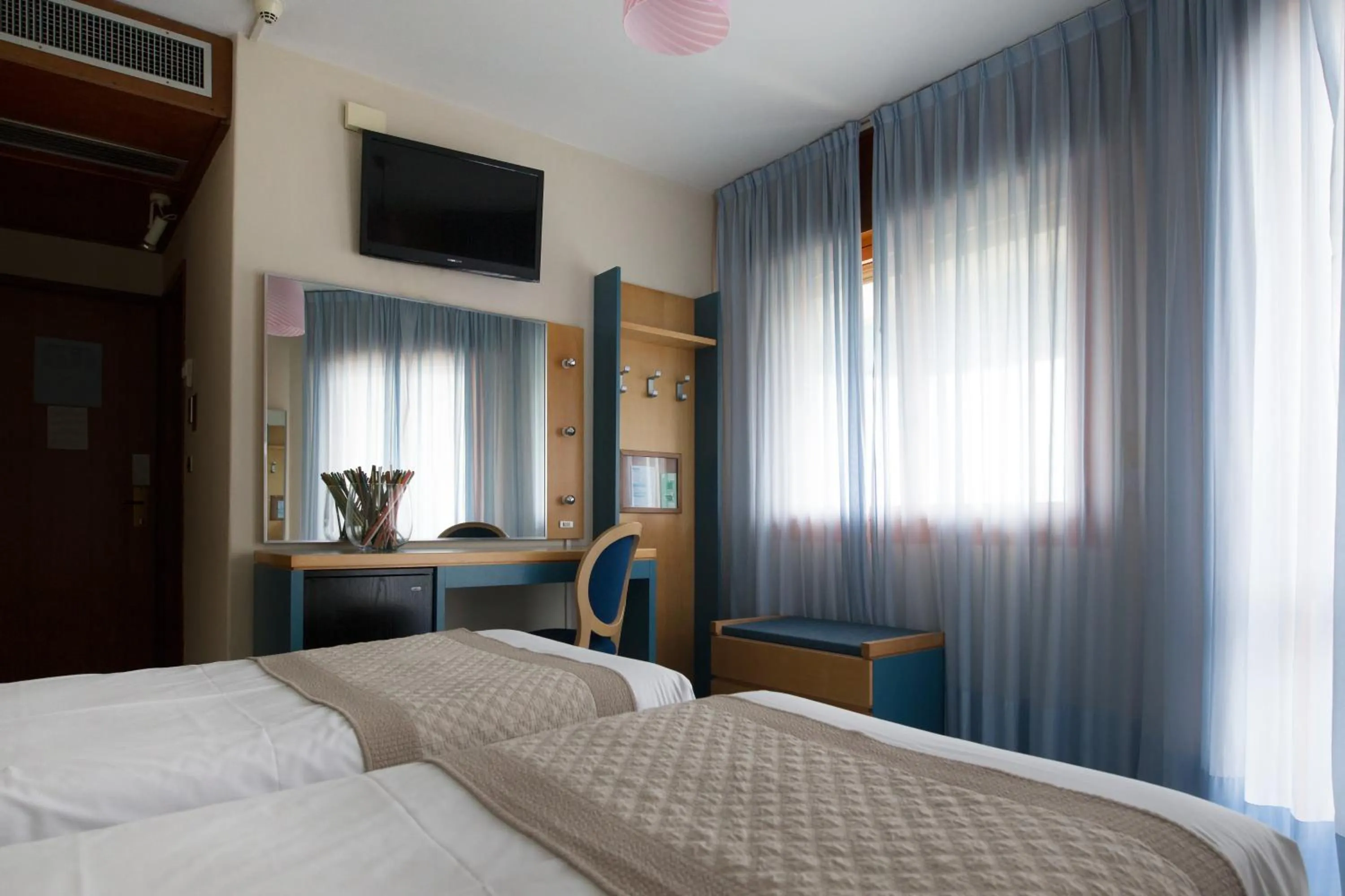 Bed in Hotel Monaco & Quisisana