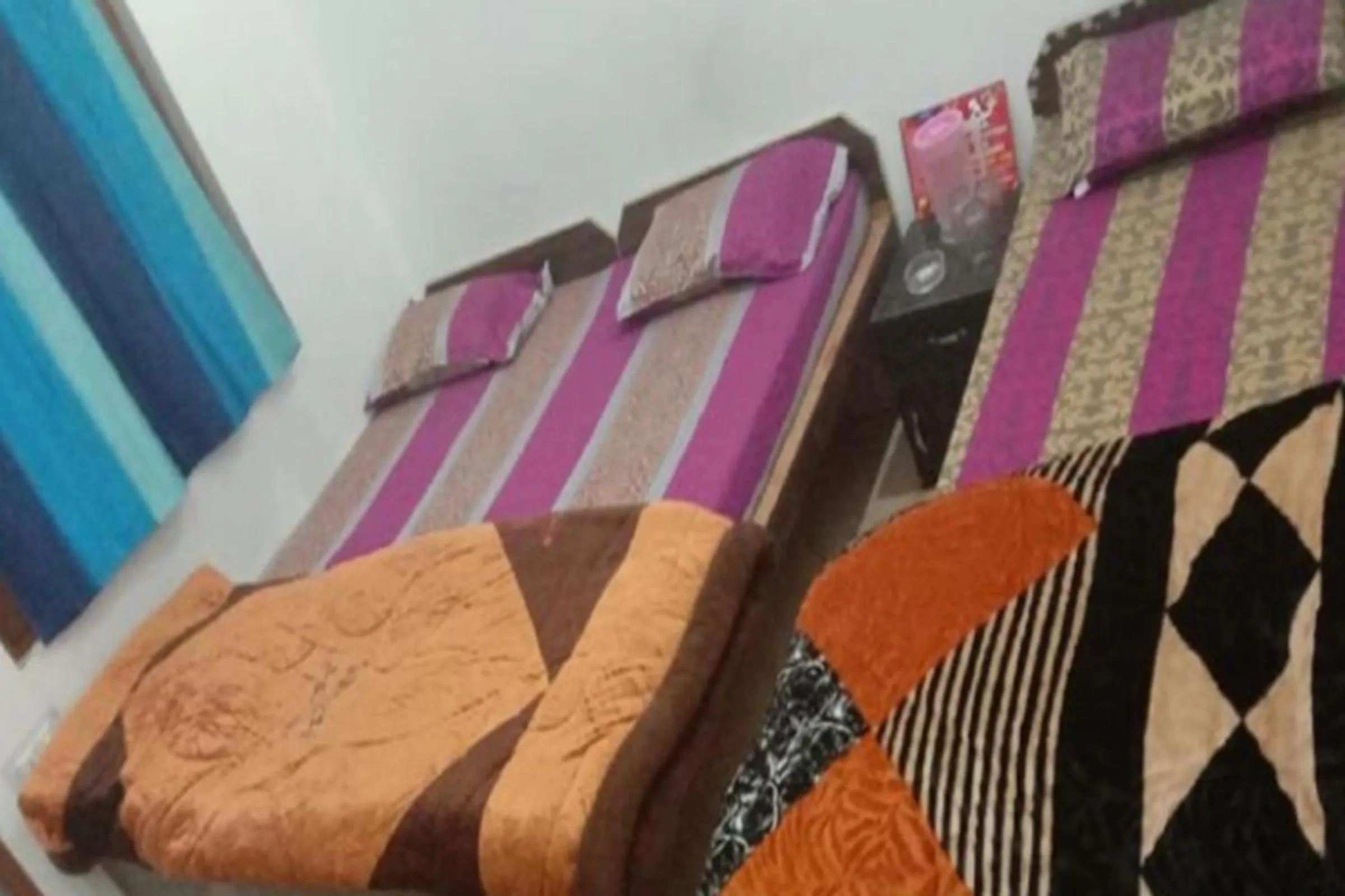 Bed in HOTEL PUSPWAN AND RESTAURANT by StayApart