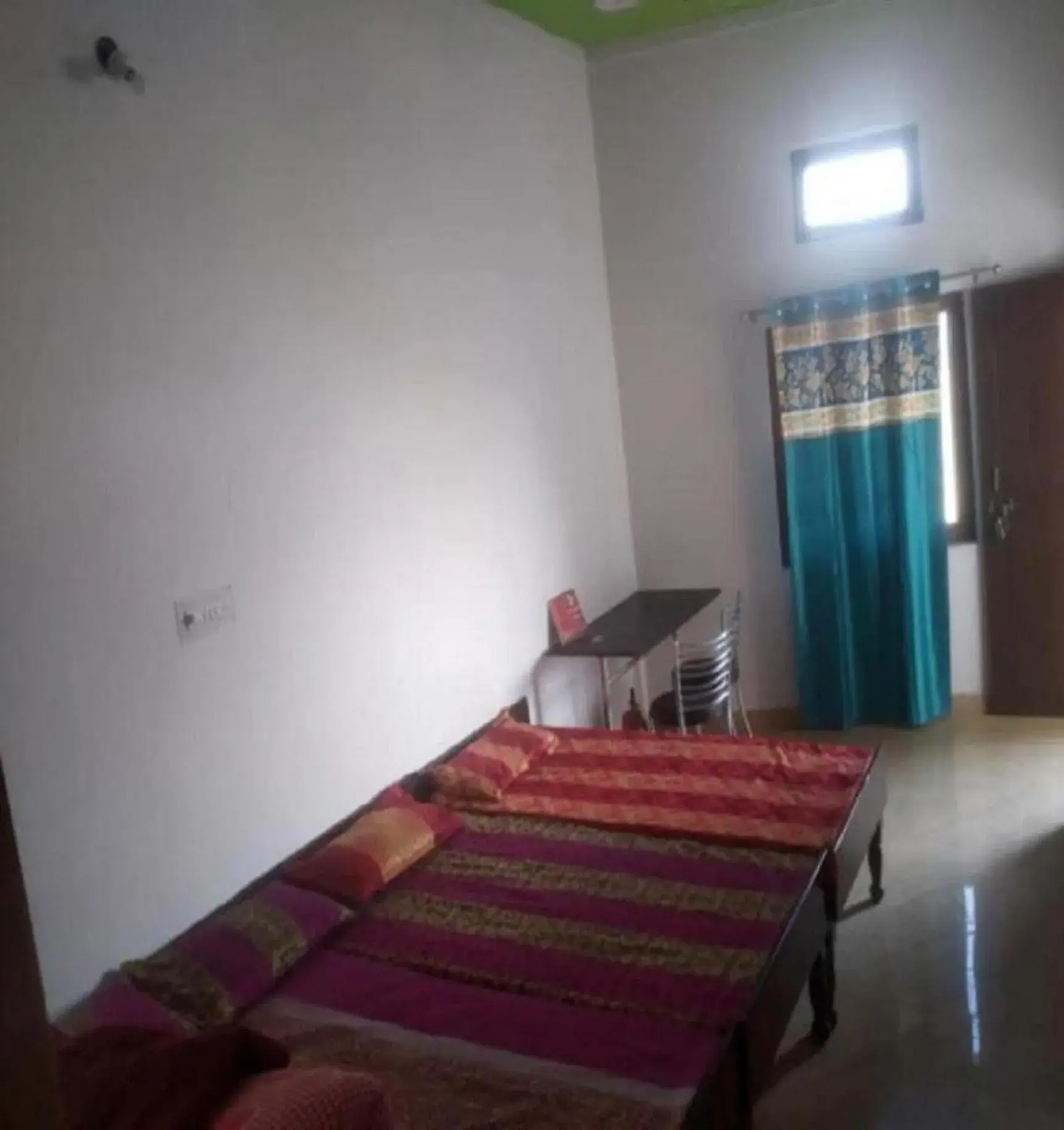 Basic Triple Room in HOTEL PUSPWAN AND RESTAURANT by StayApart Basic Triple Room in HOTEL PUSPWAN AND RESTAURANT by StayApart