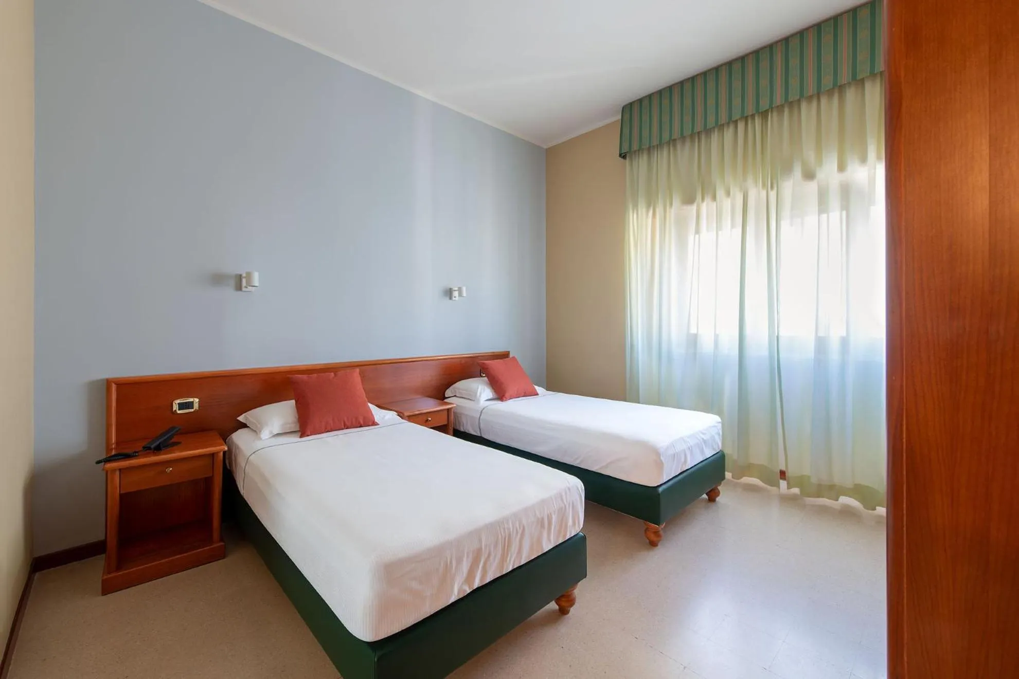 Bed in Astura Palace Hotel
