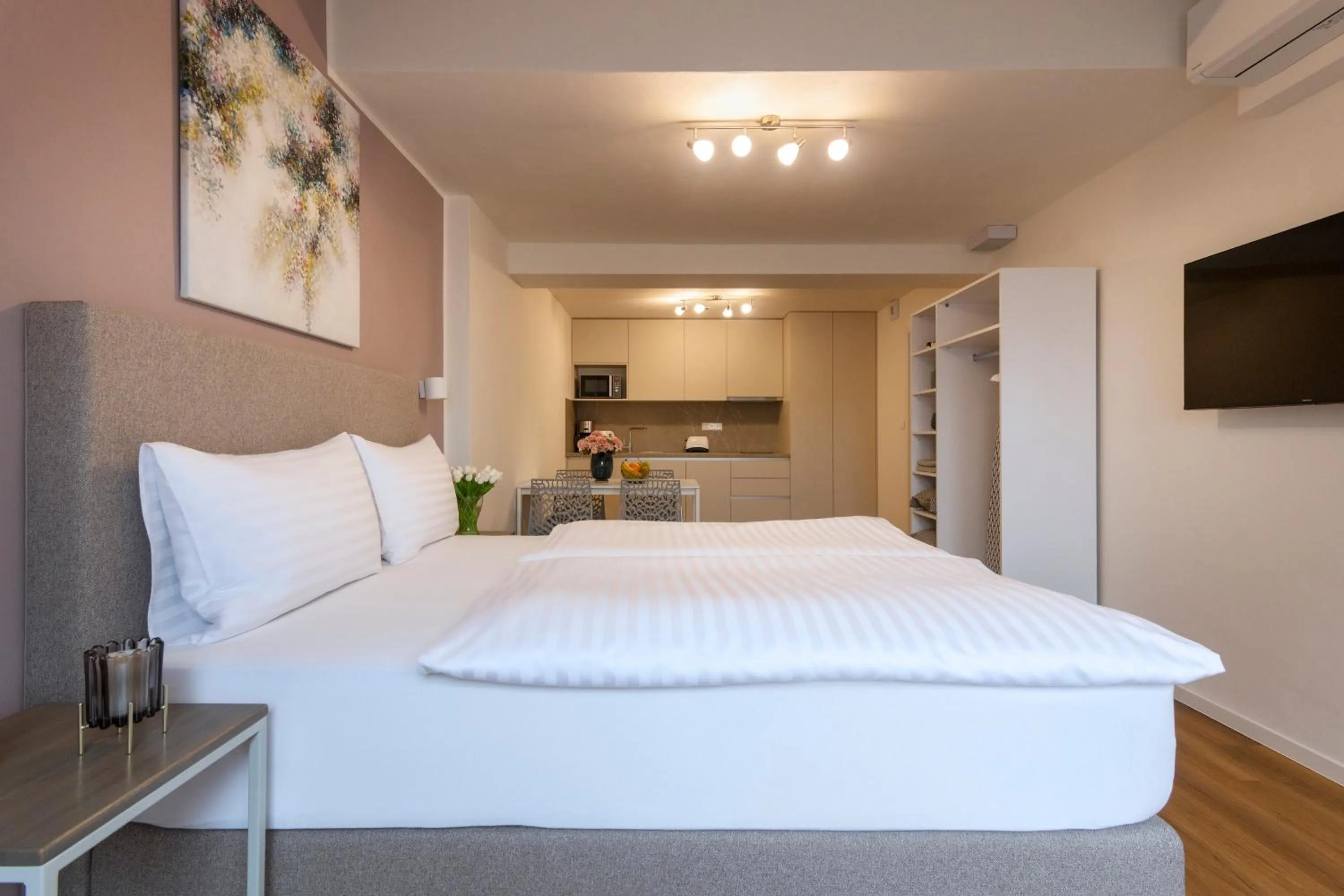 Bed in Hidden Art Boutique Residence by Dwellfort