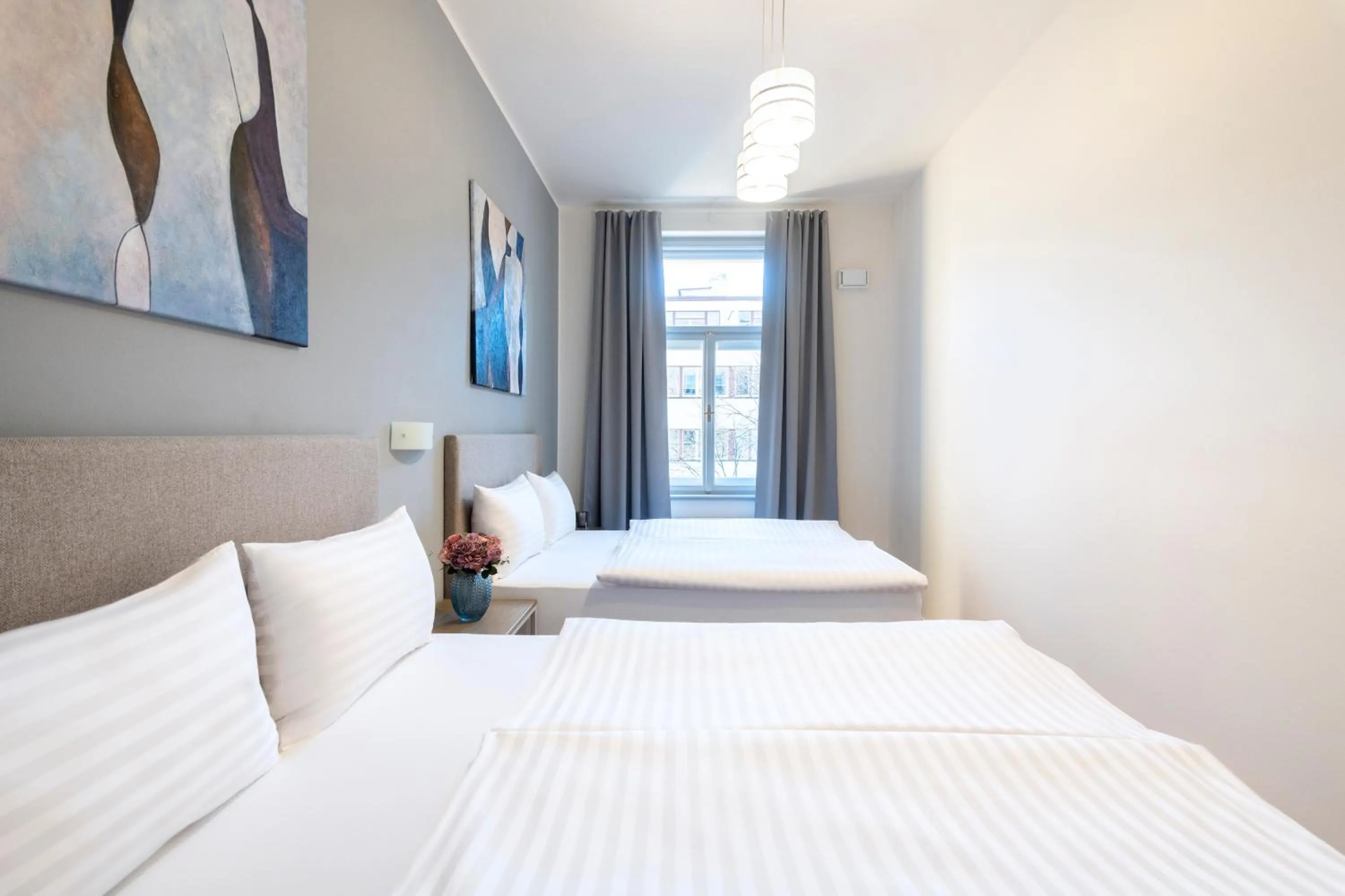 Bed in Hidden Art Boutique Residence by Dwellfort