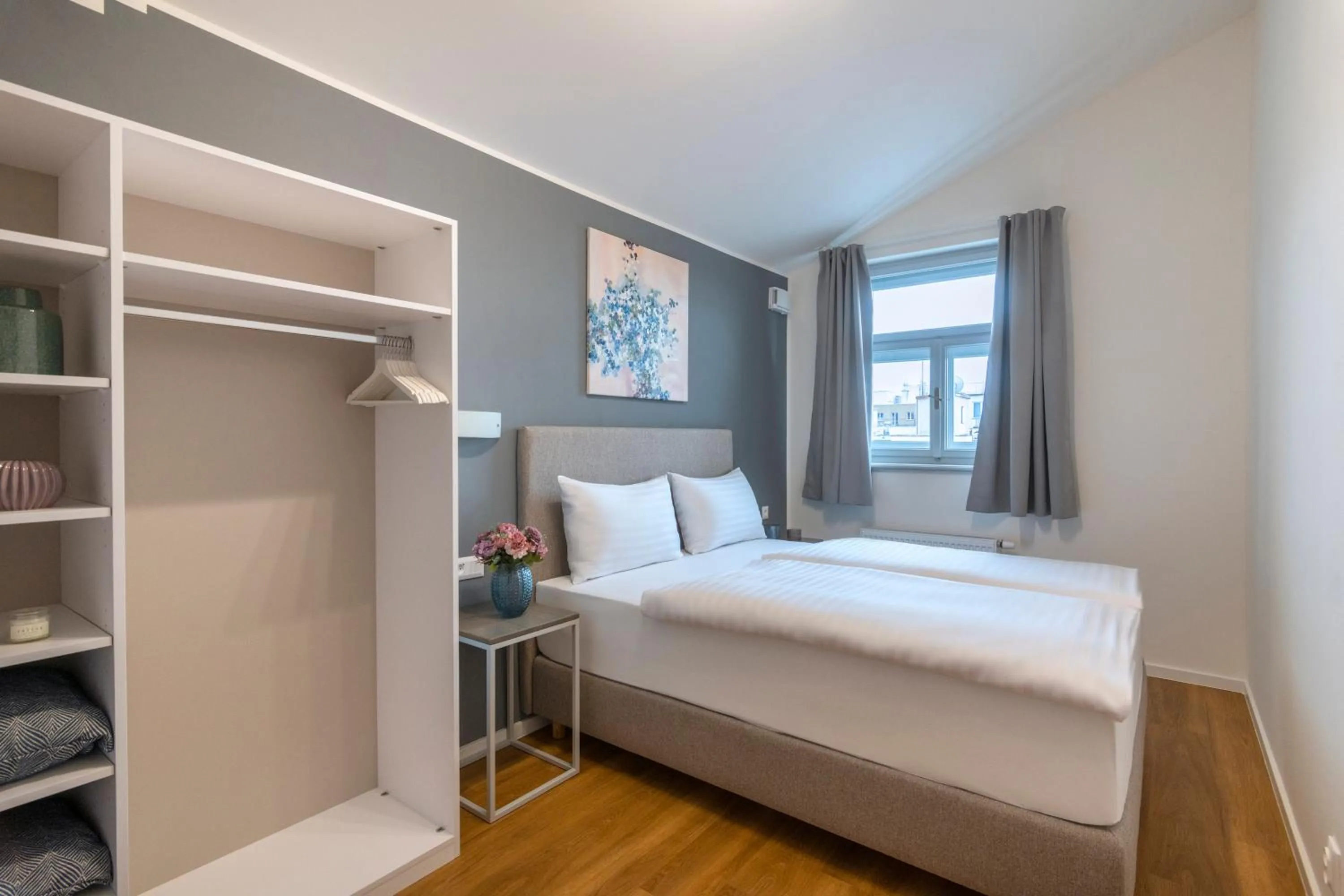 Bed in Hidden Art Boutique Residence by Dwellfort