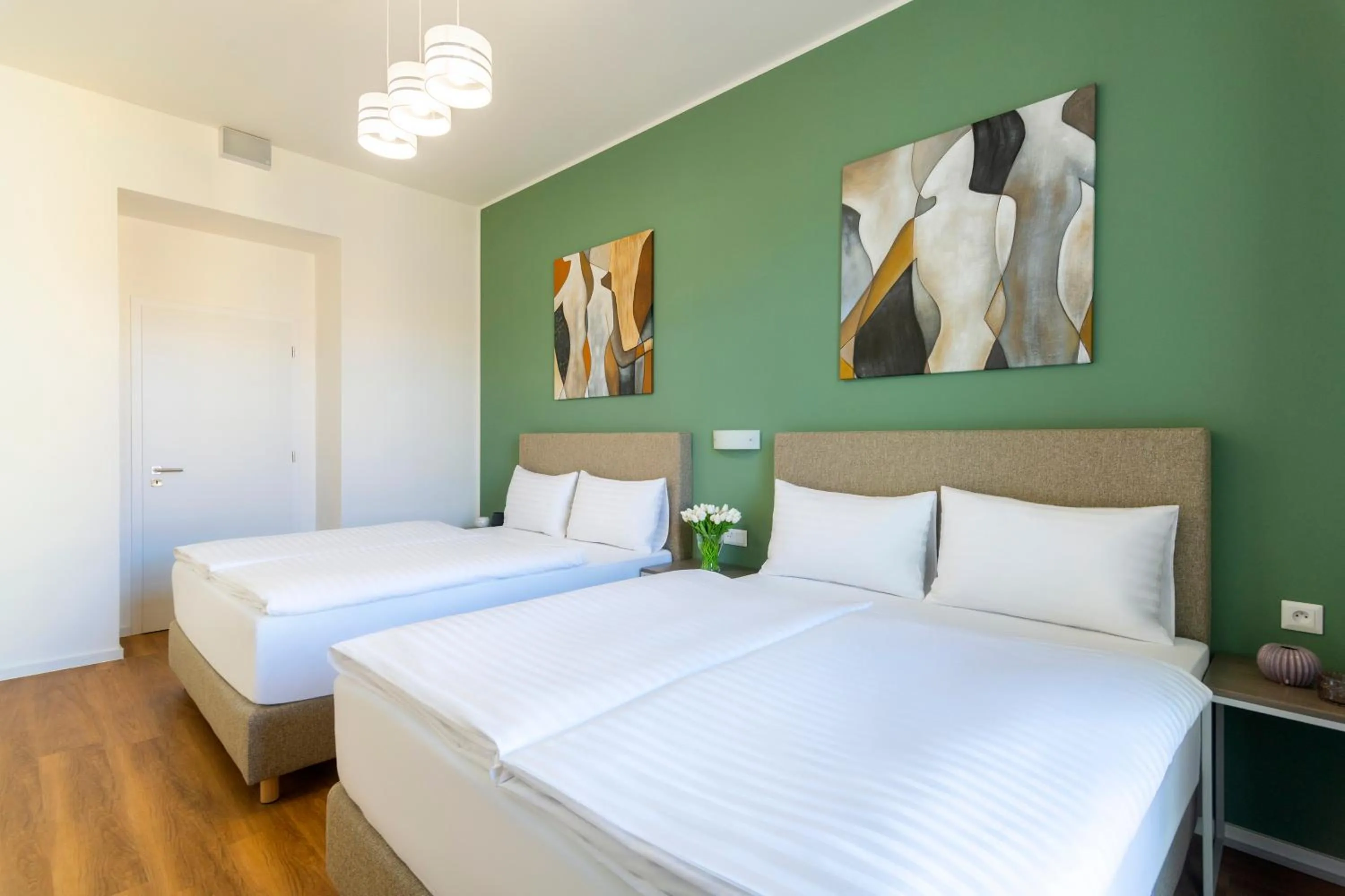 Bedroom, Bed in Hidden Art Boutique Residence by Dwellfort