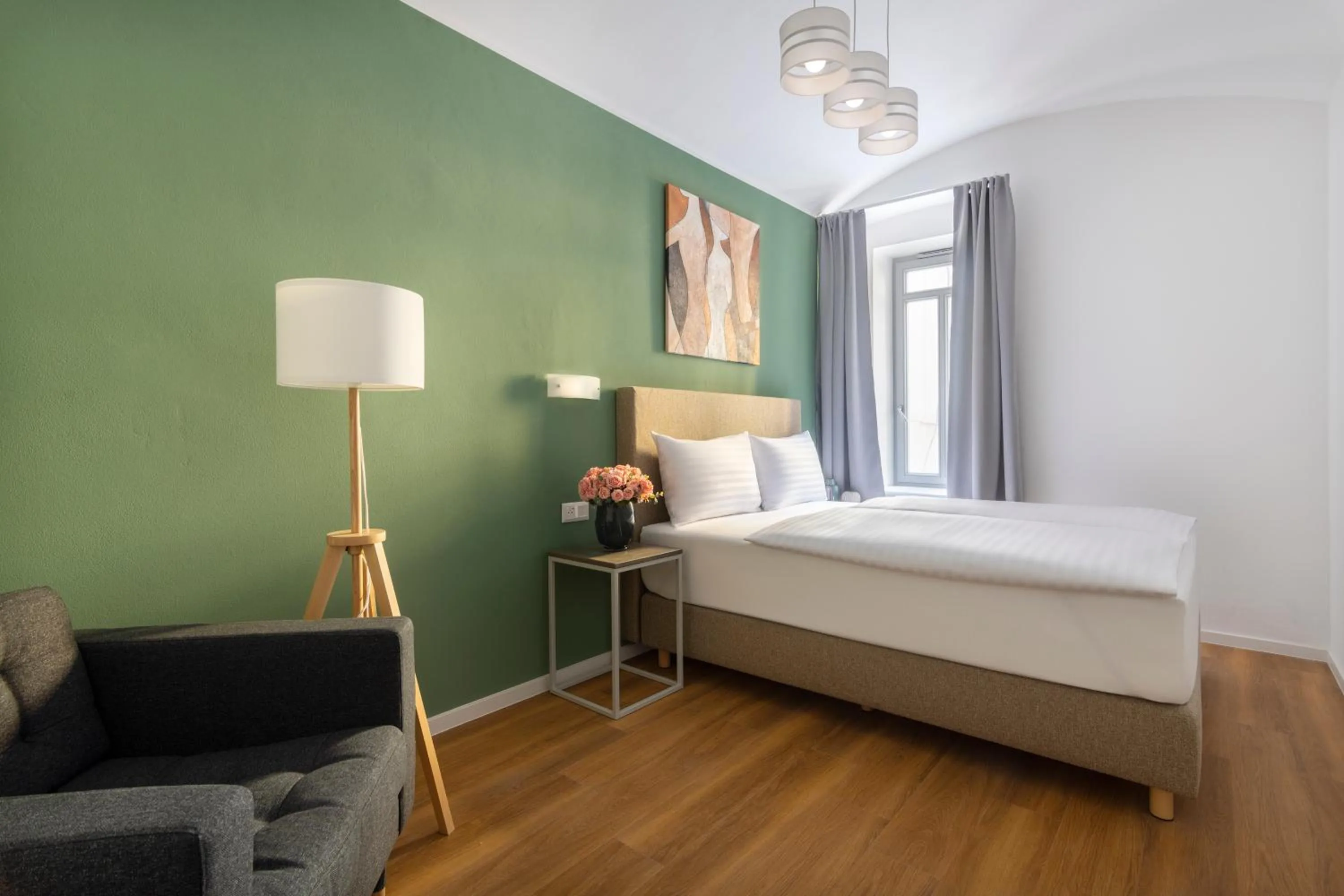 Bed in Hidden Art Boutique Residence by Dwellfort