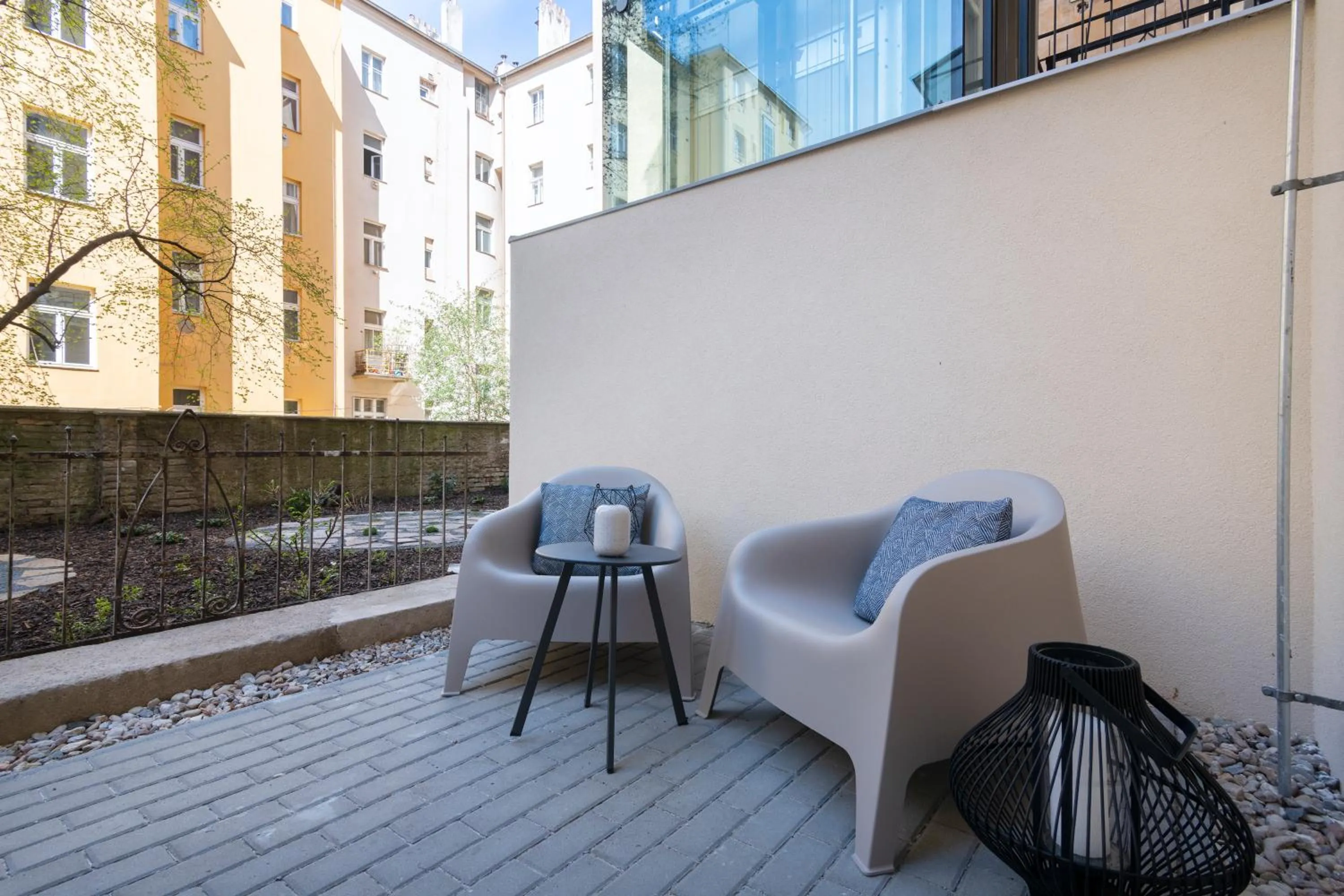Seating area in Hidden Art Boutique Residence by Dwellfort