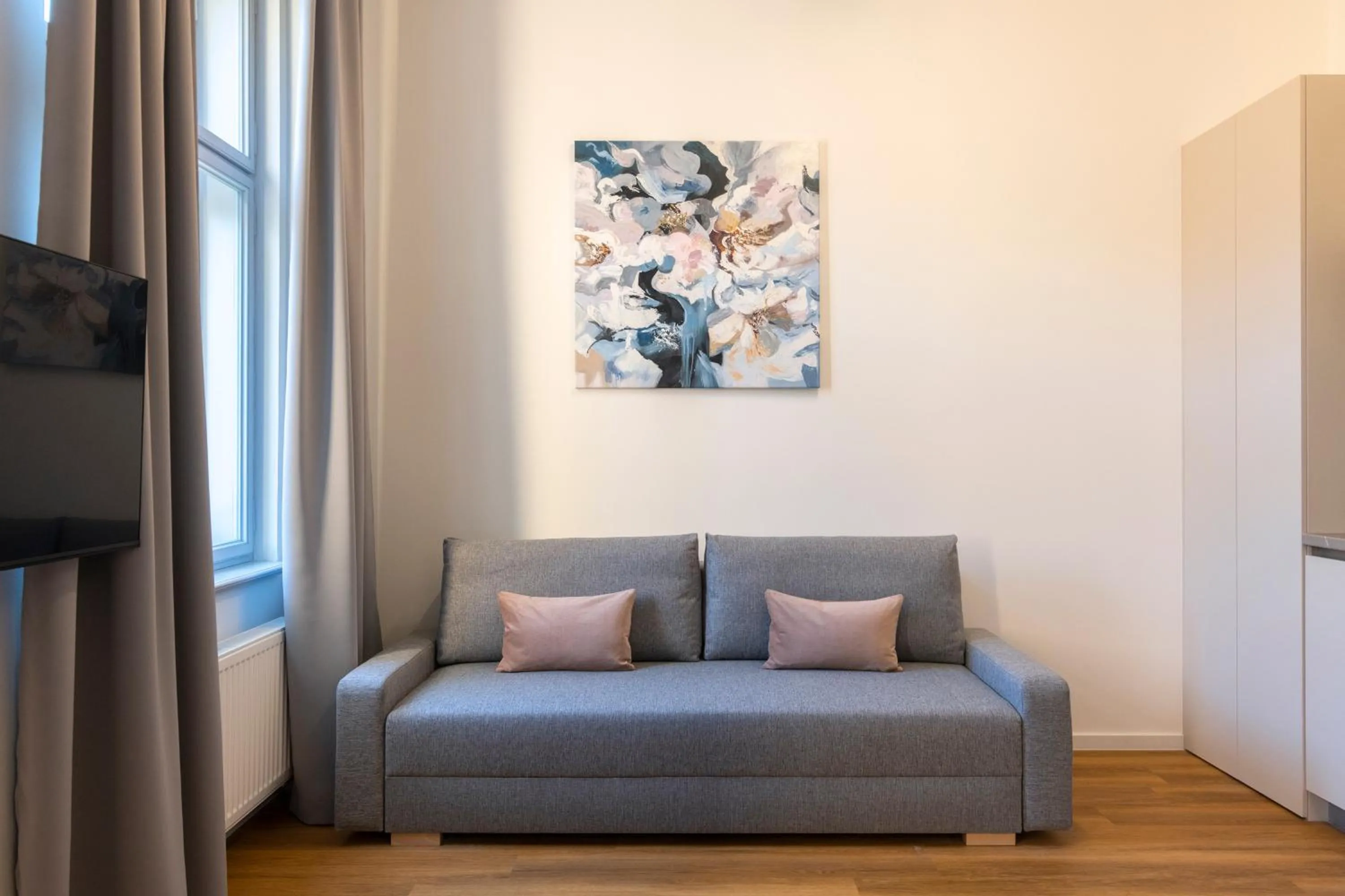 Seating area in Hidden Art Boutique Residence by Dwellfort