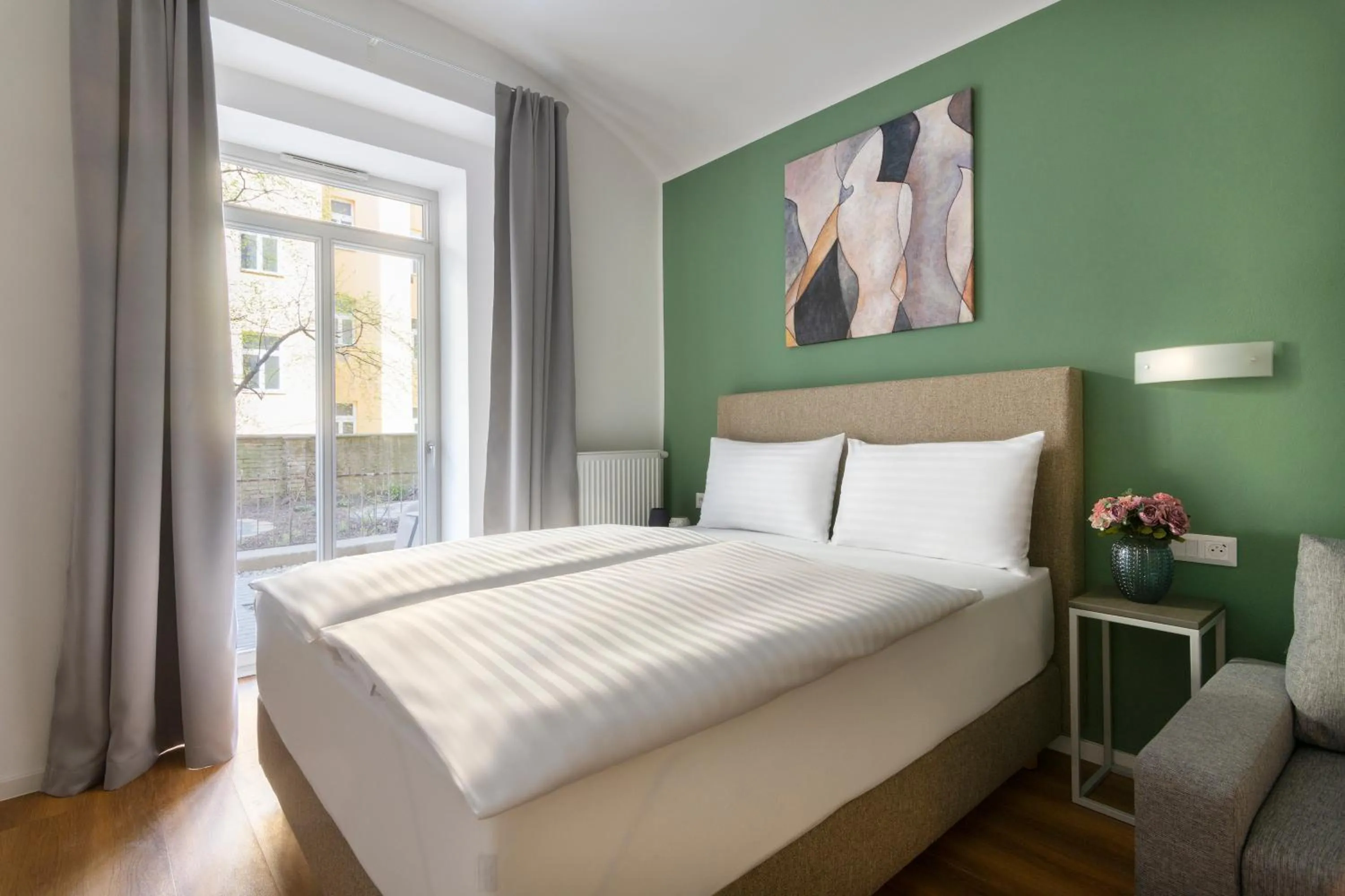 Bed in Hidden Art Boutique Residence by Dwellfort