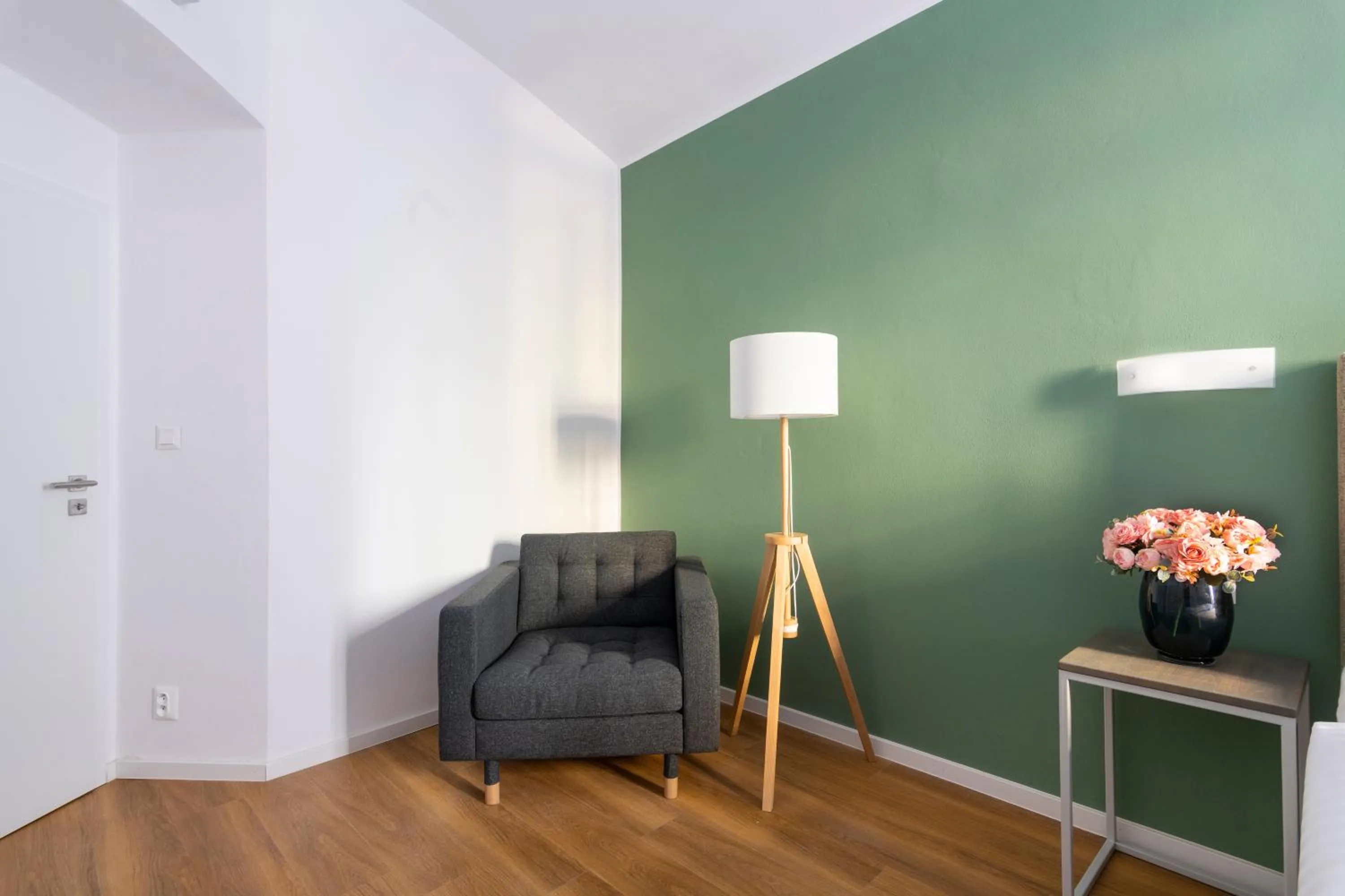 Seating area in Hidden Art Boutique Residence by Dwellfort