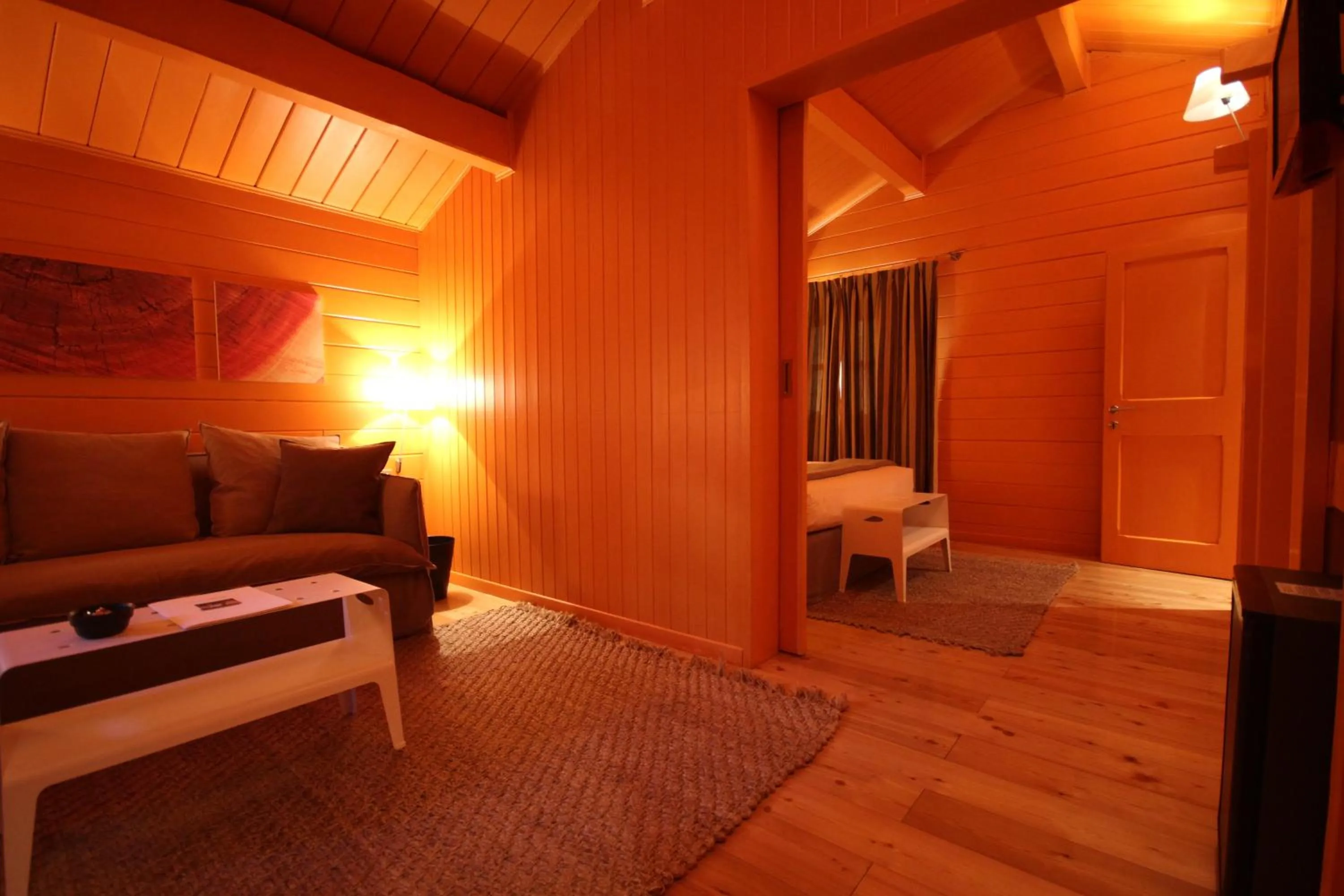 Living room, Bed in Hotel Village