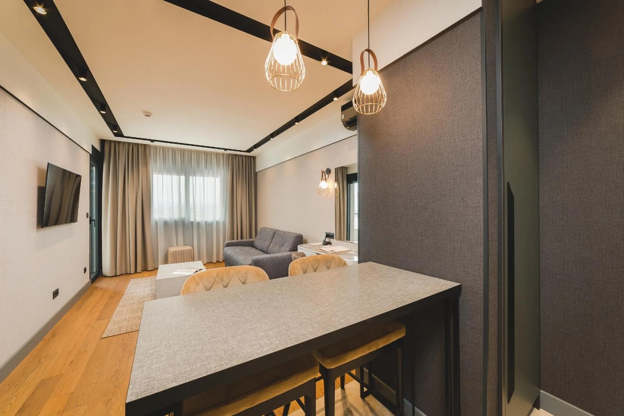 Living room, Bed in SIGNUM Hotel