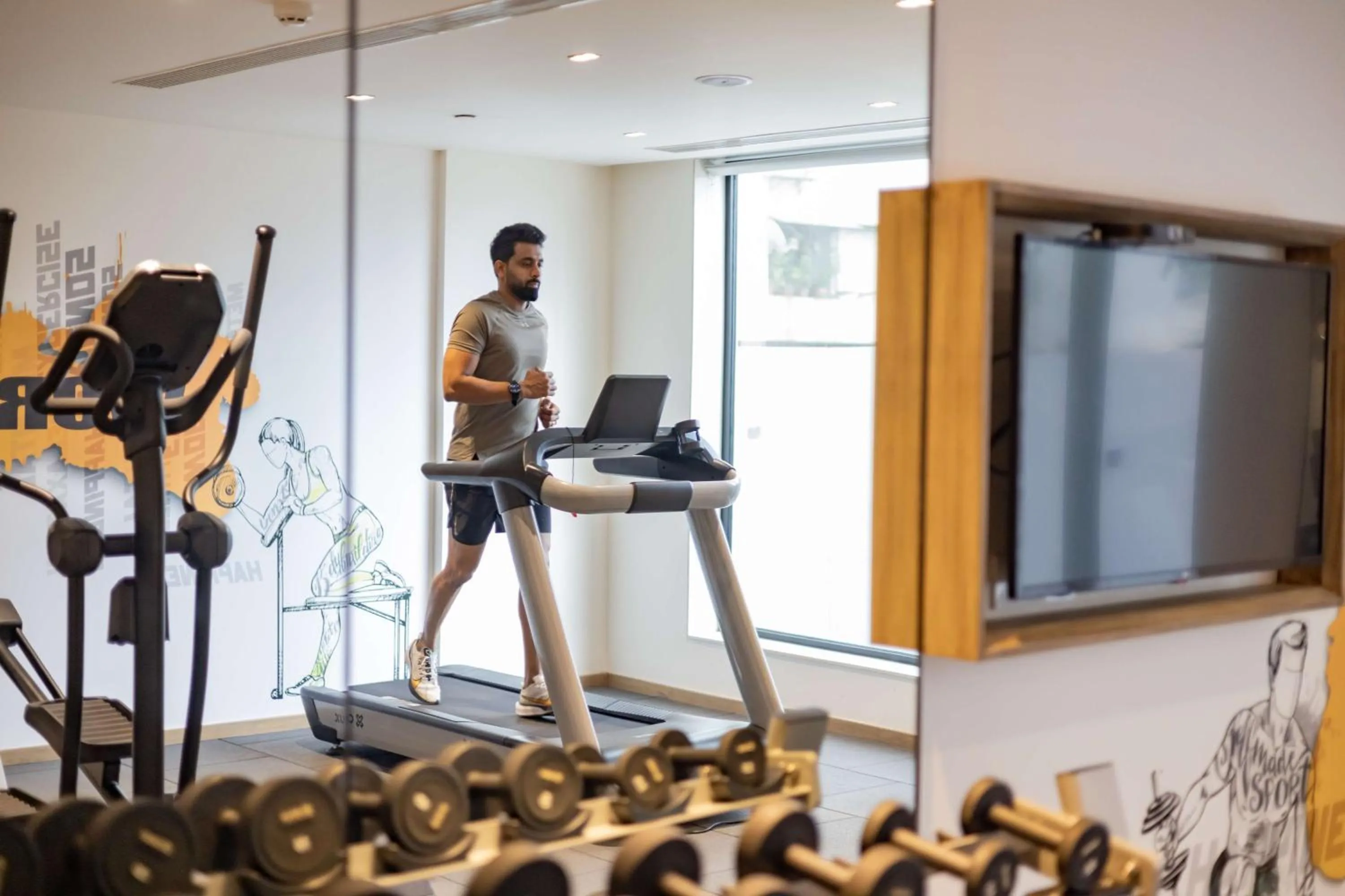 Fitness centre/facilities in Park Inn by Radisson Surat