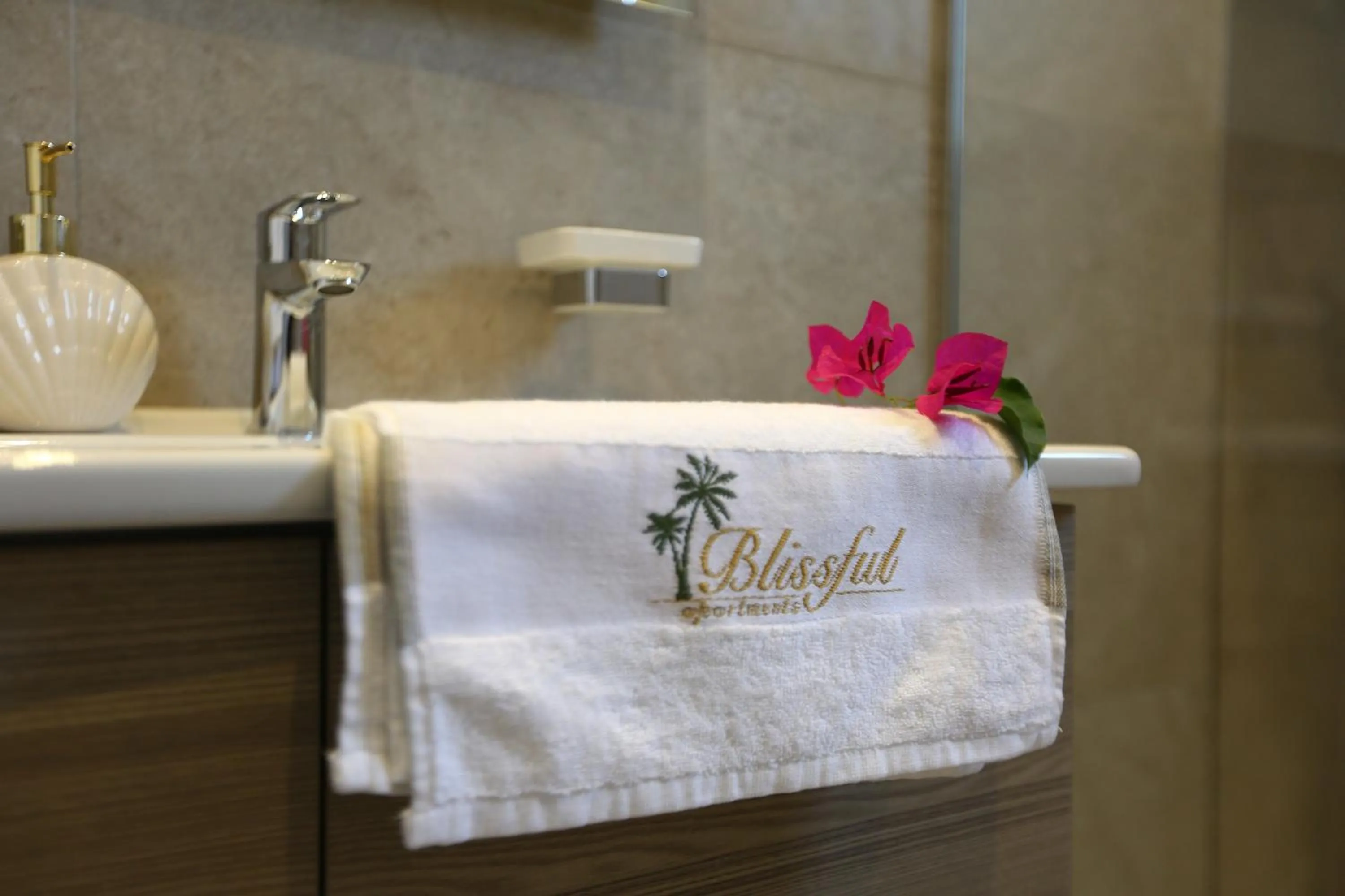 Property logo or sign in Blissful Apartments