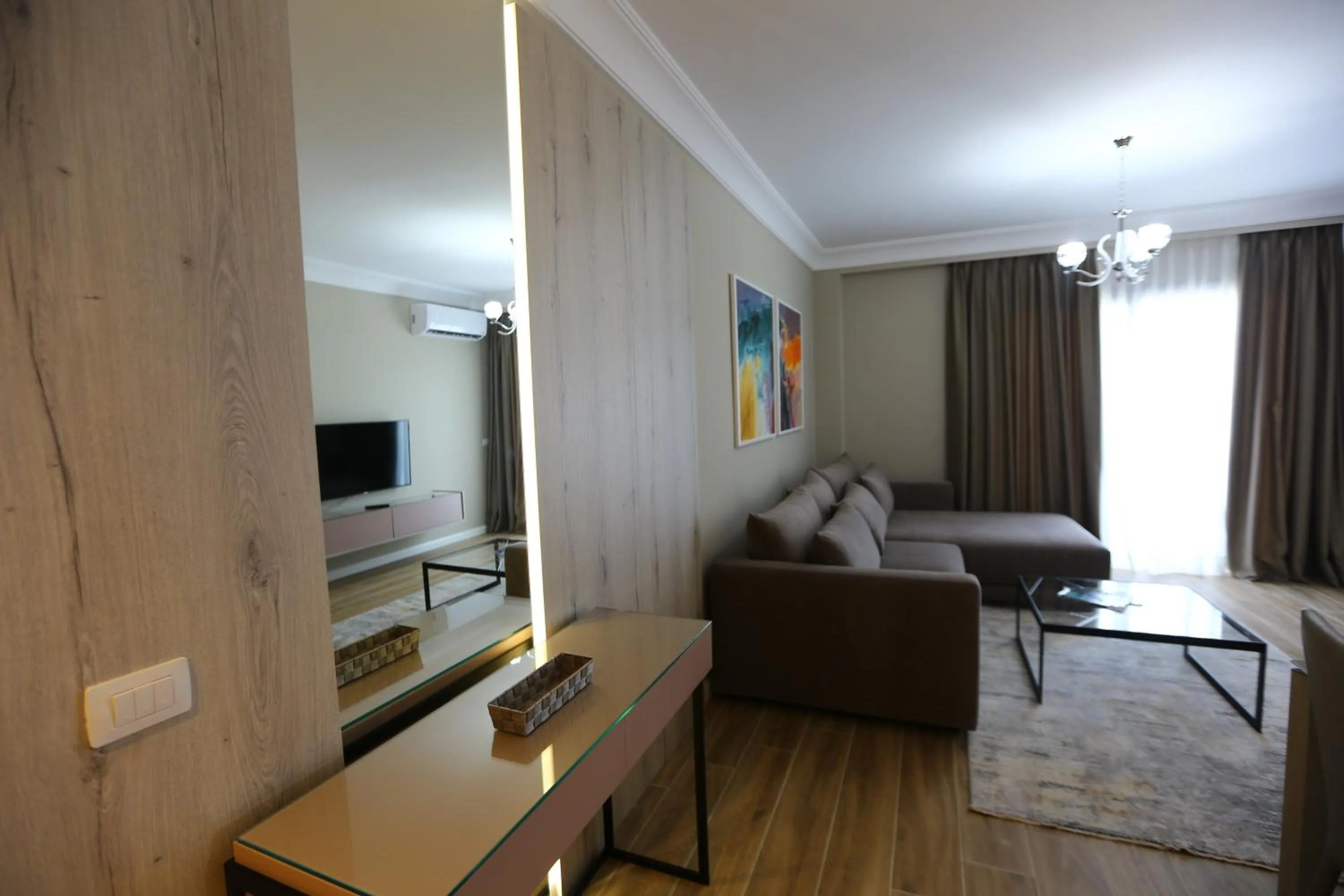 Living room in Blissful Apartments