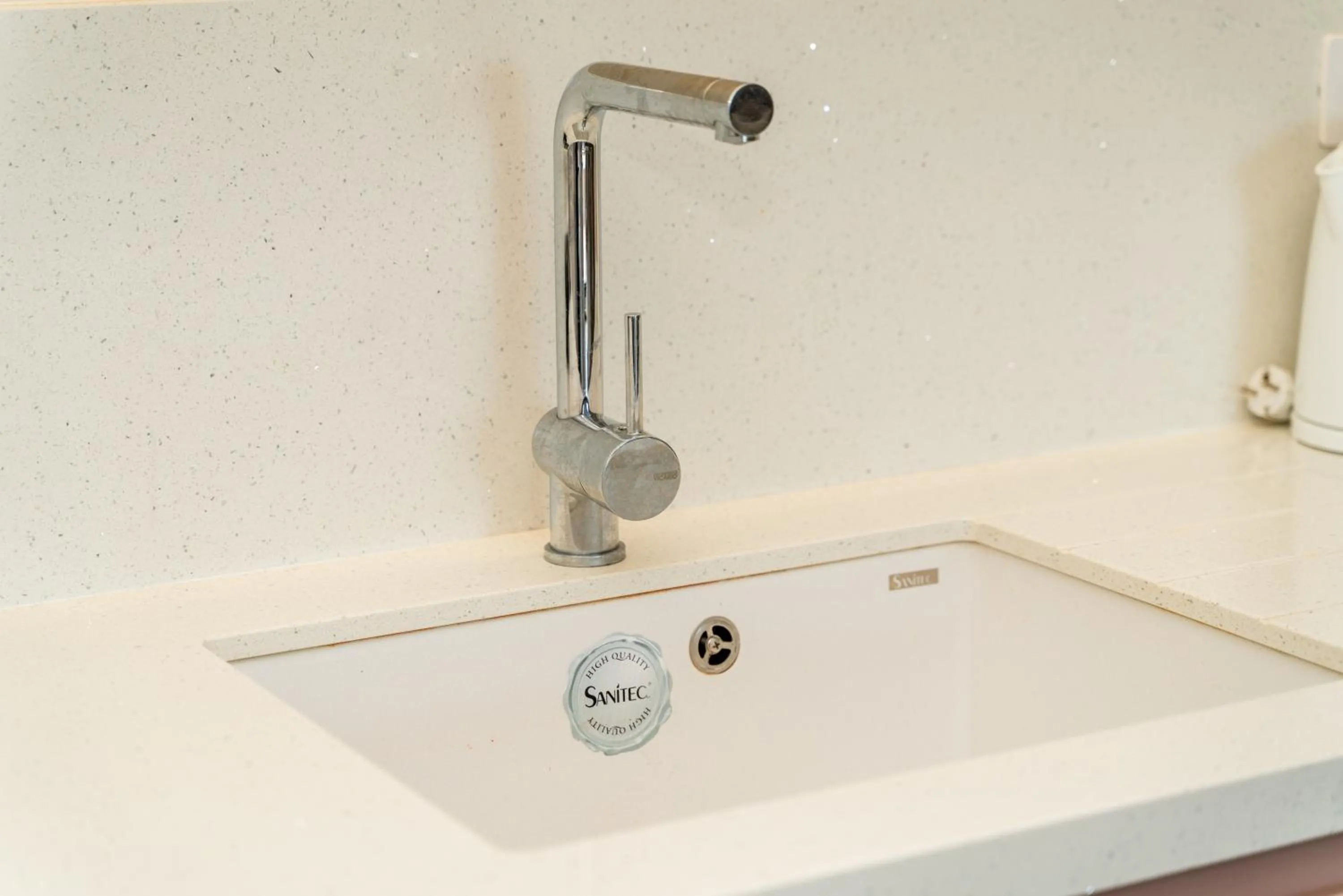 kitchen in Blissful Apartments