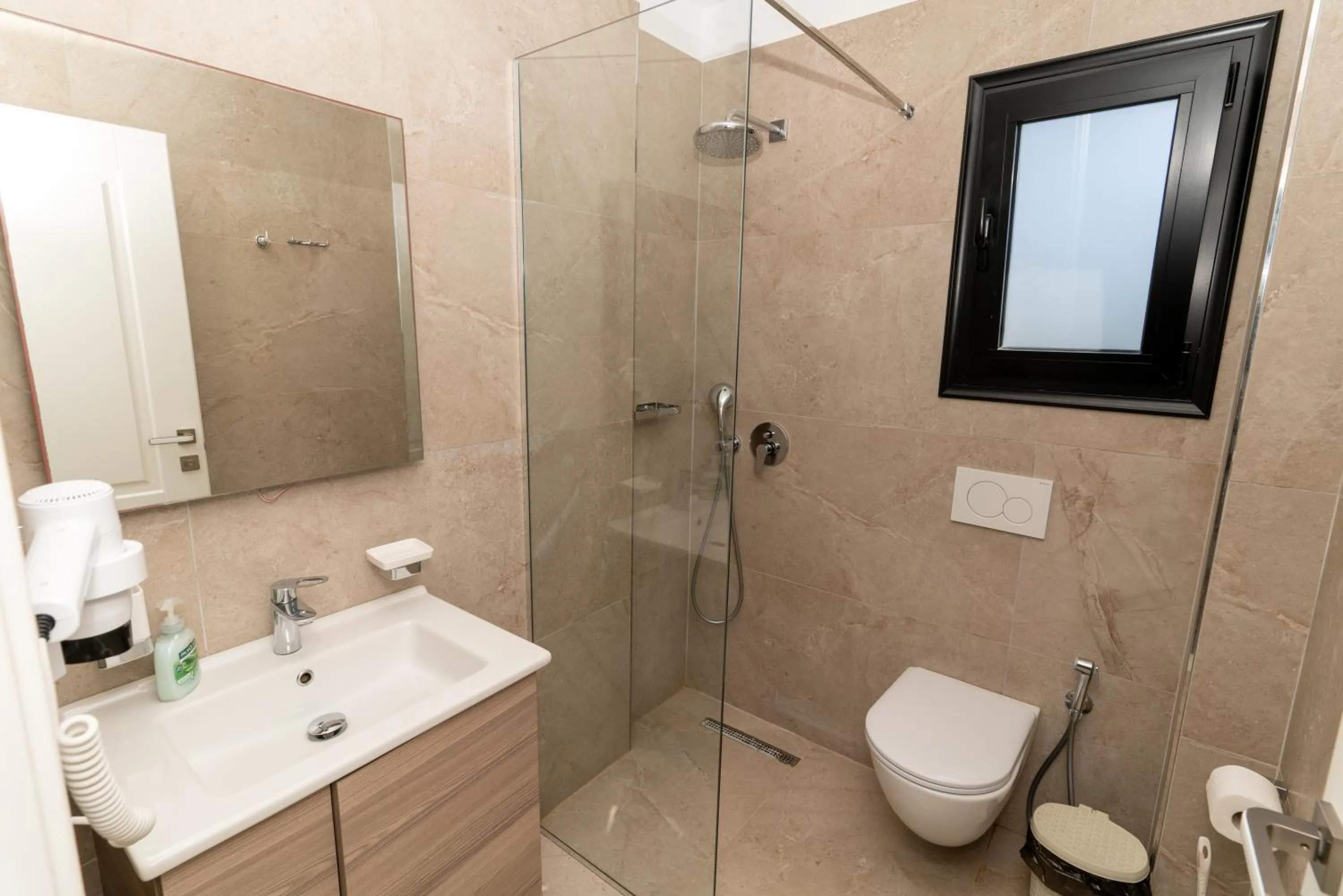 Shower in Blissful Apartments