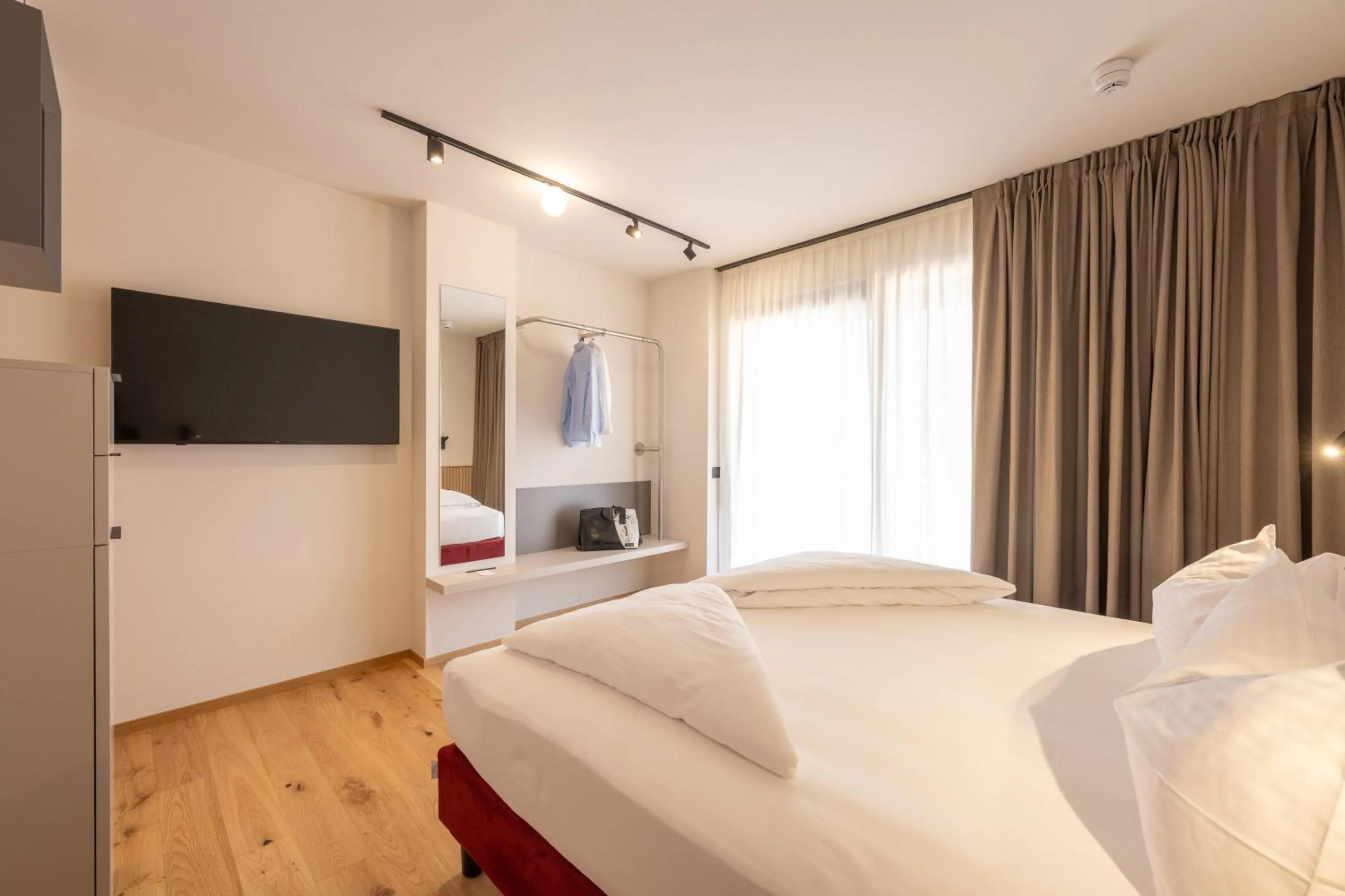 Bedroom, Bed in Etra Suites & Apartments