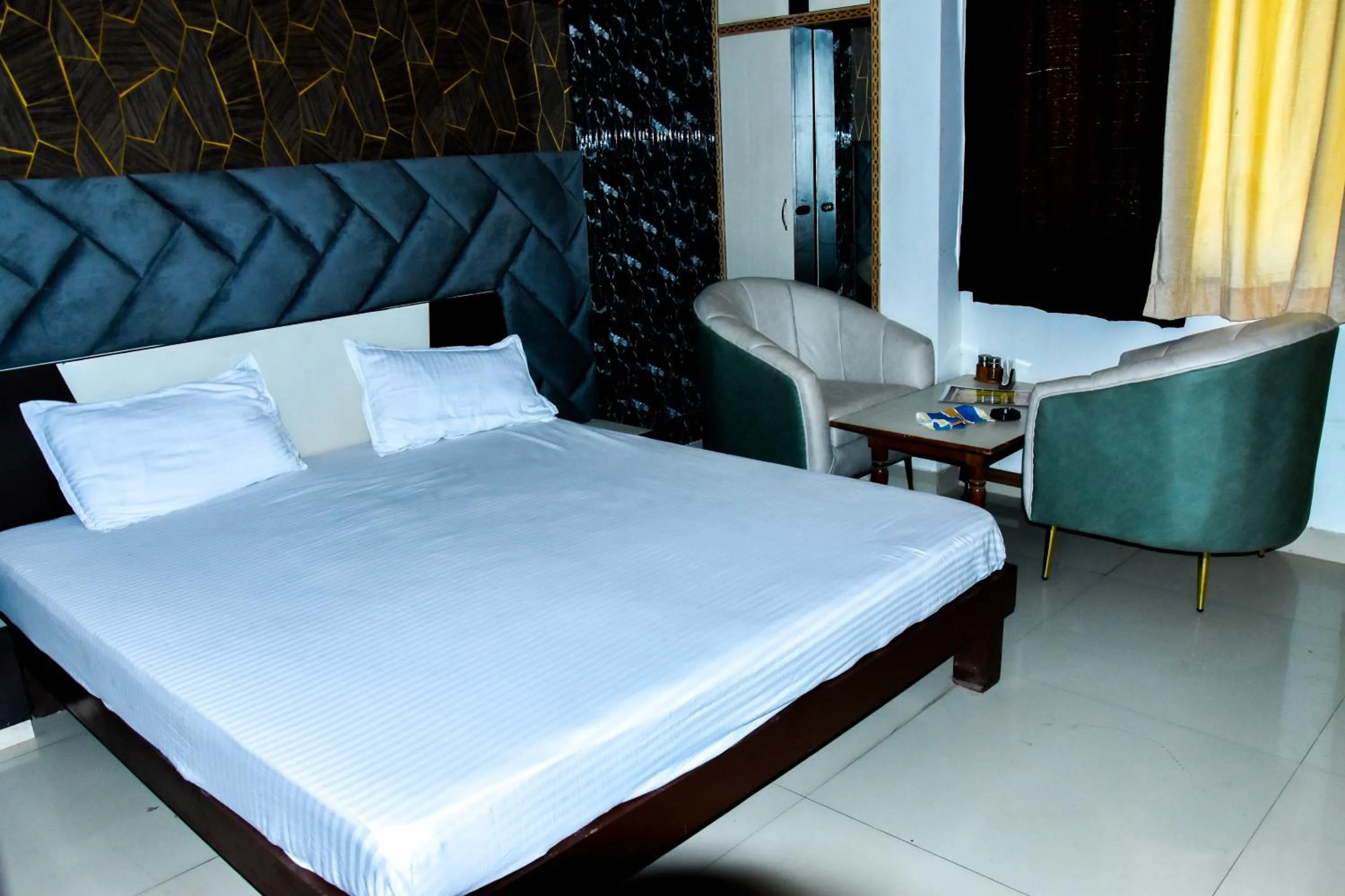 Bed in Sangam Hotel