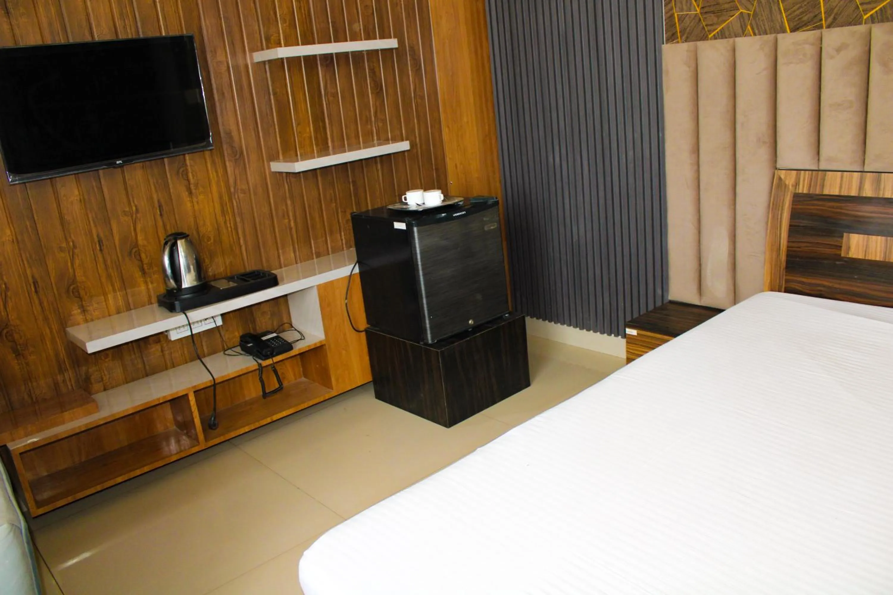 Bed in Sangam Hotel