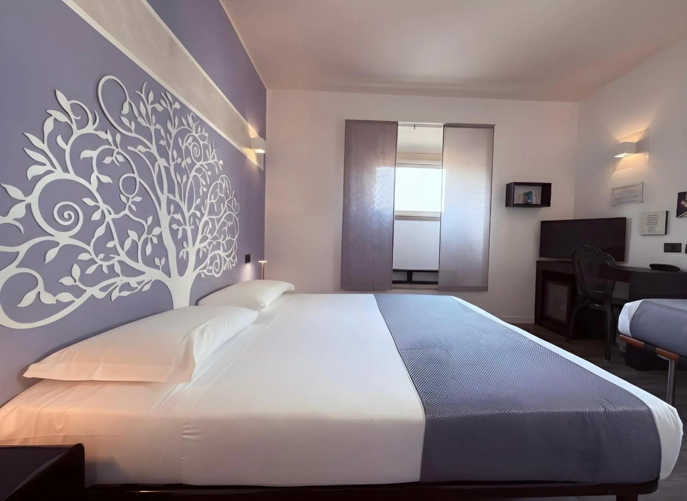 Standard Triple Room in Hotel Europa Varese Standard Triple Room in Hotel Europa Varese