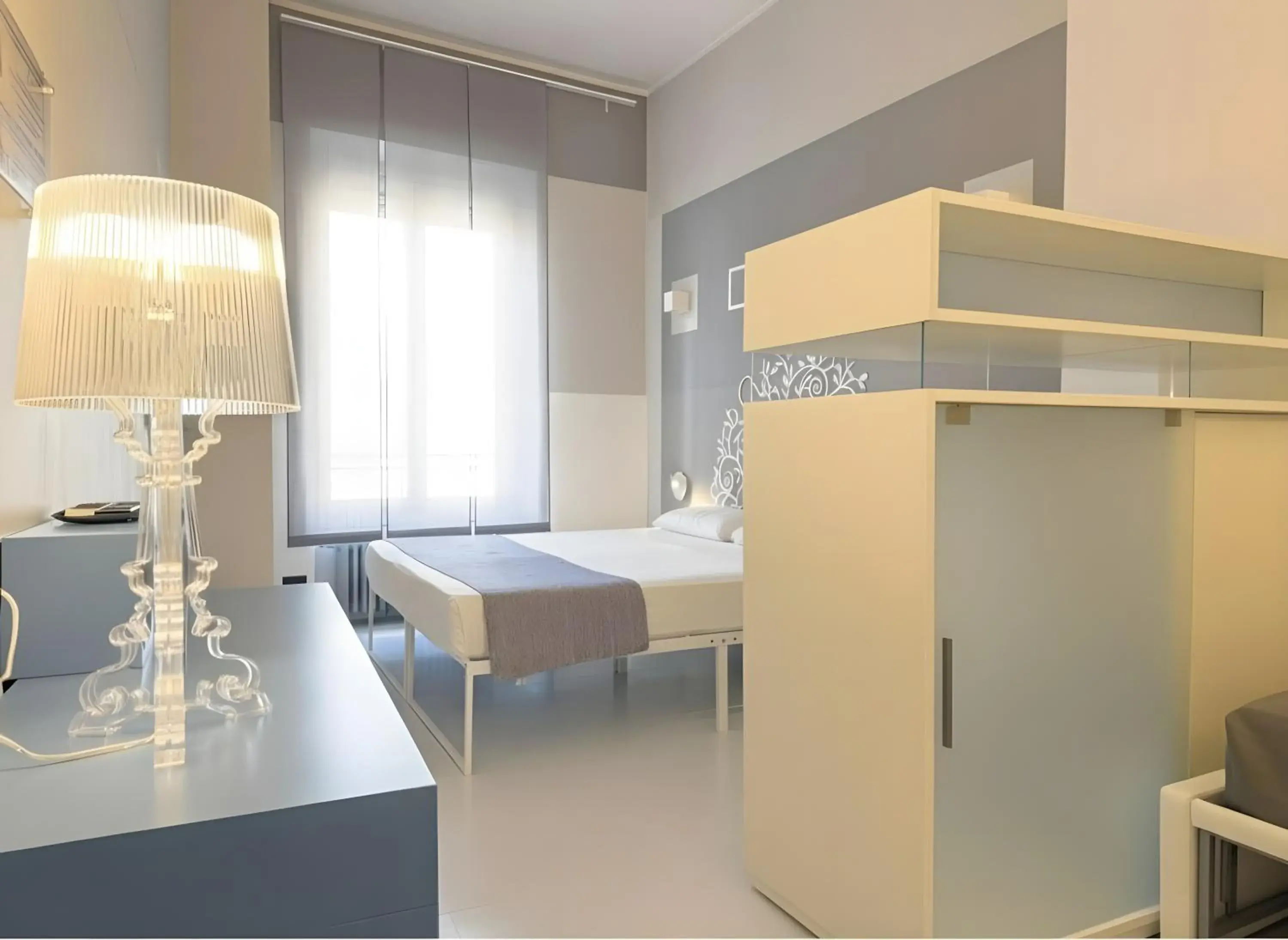 Standard Quadruple Room in Hotel Europa Varese Standard Quadruple Room in Hotel Europa Varese