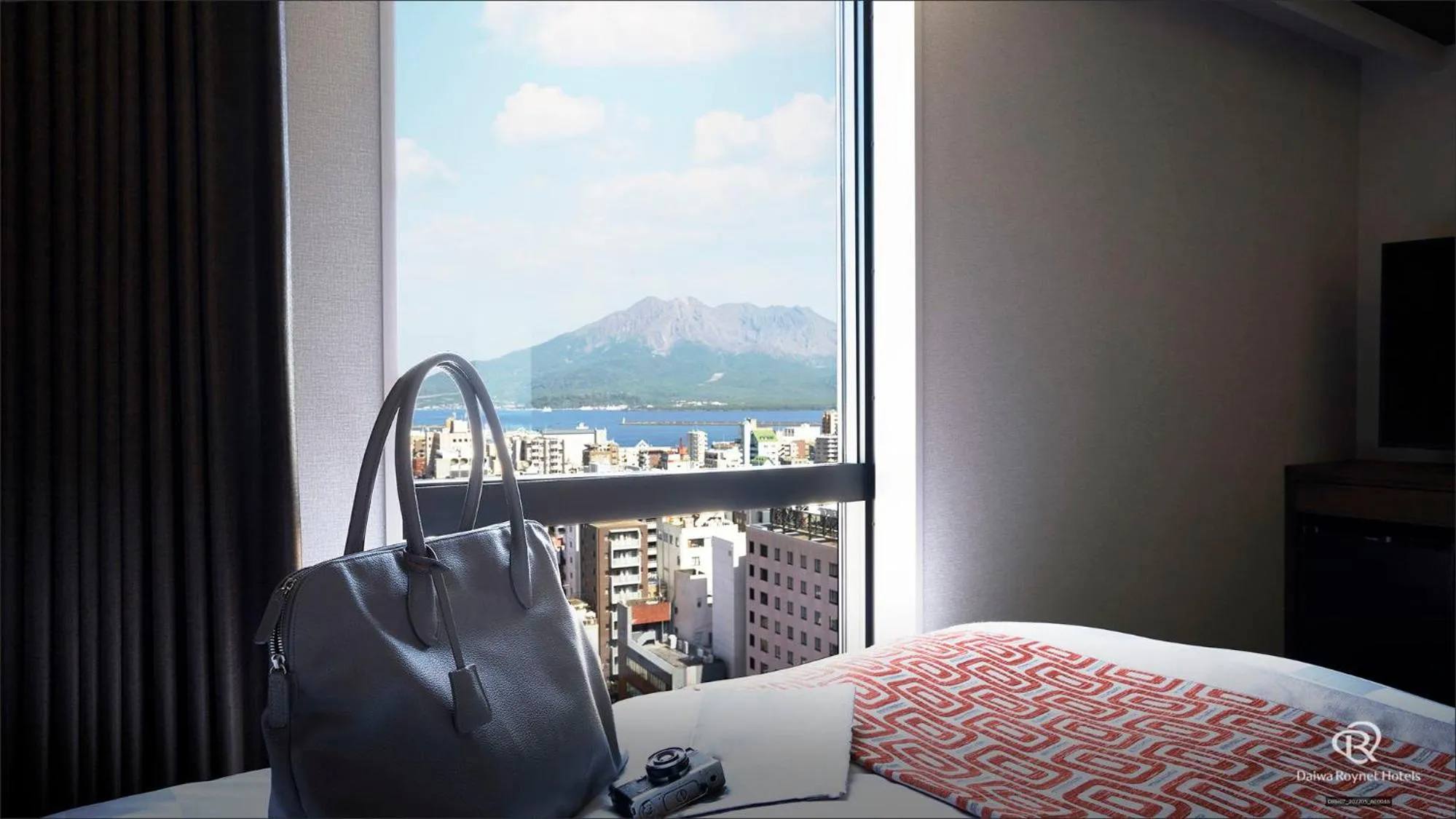 View (from property/room), Bed in Daiwa Roynet Hotel Kagoshima Tenmonkan PREMIER - former Daiwa Roynet Hotel Kagoshima Tenmonkan