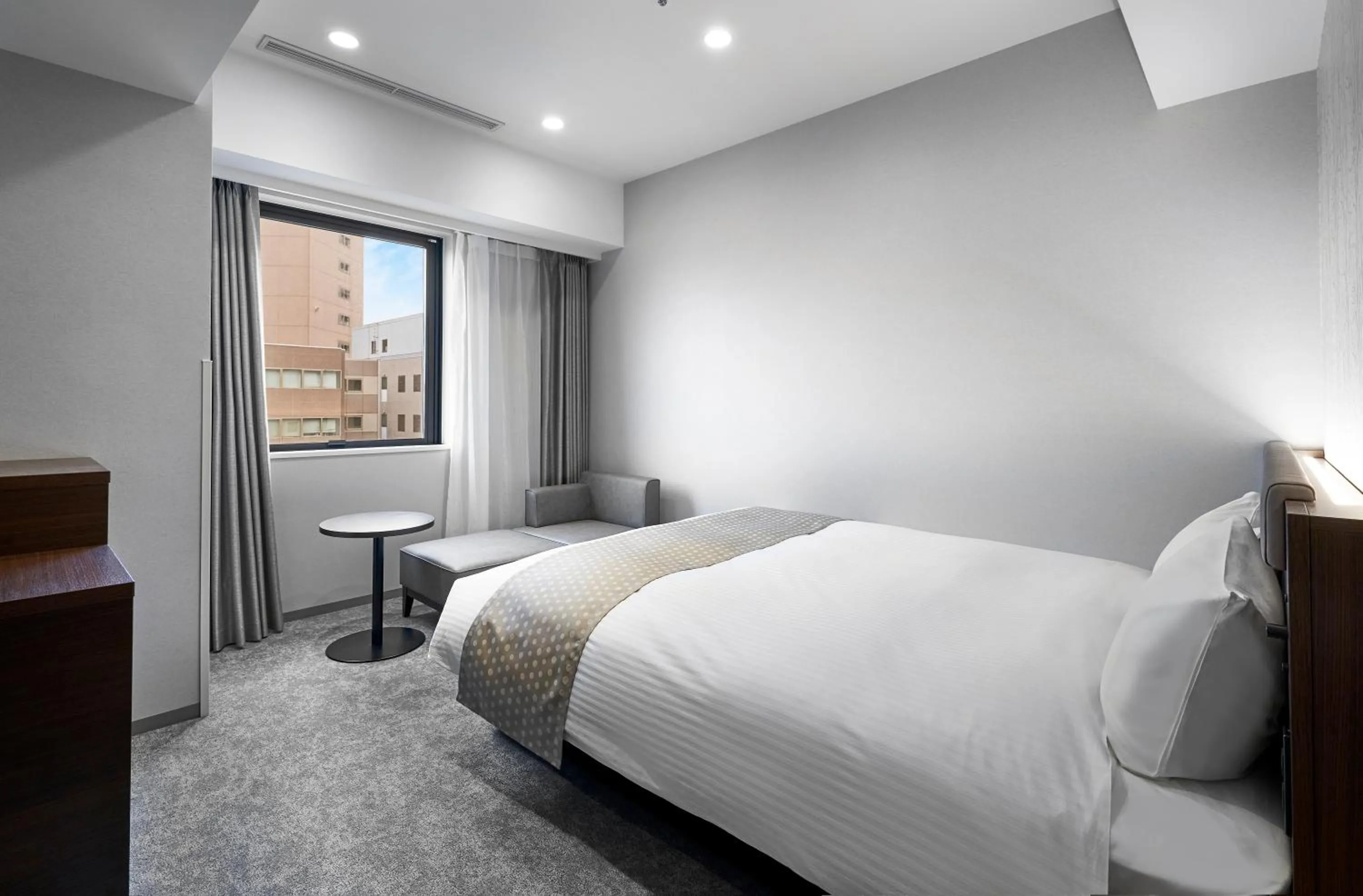 Photo of the whole room, Bed in Daiwa Roynet Hotel Sapporo Nakajima Koen