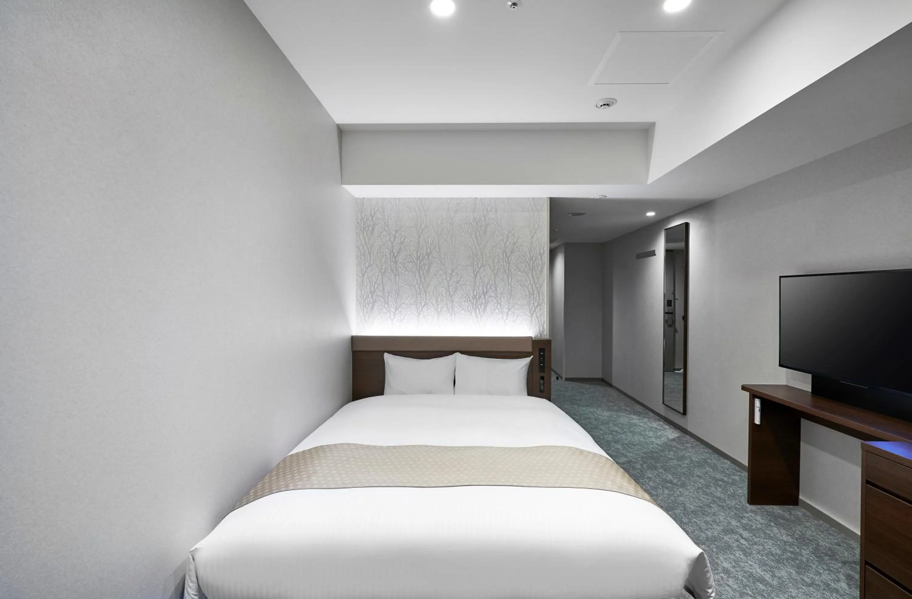 Photo of the whole room, Bed in Daiwa Roynet Hotel Sapporo Nakajima Koen