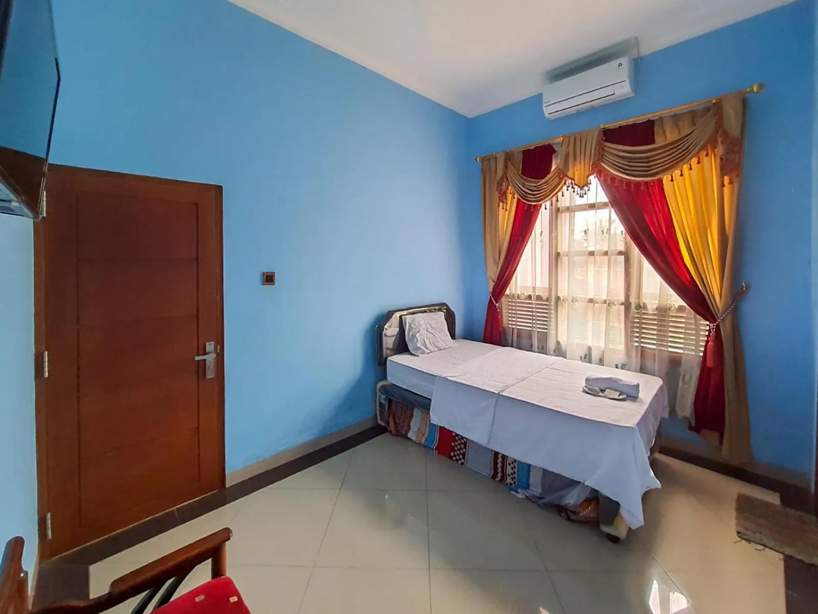 Bed in Pakde air cafe and homestay Grabag Magelang Mitra RedDoorz