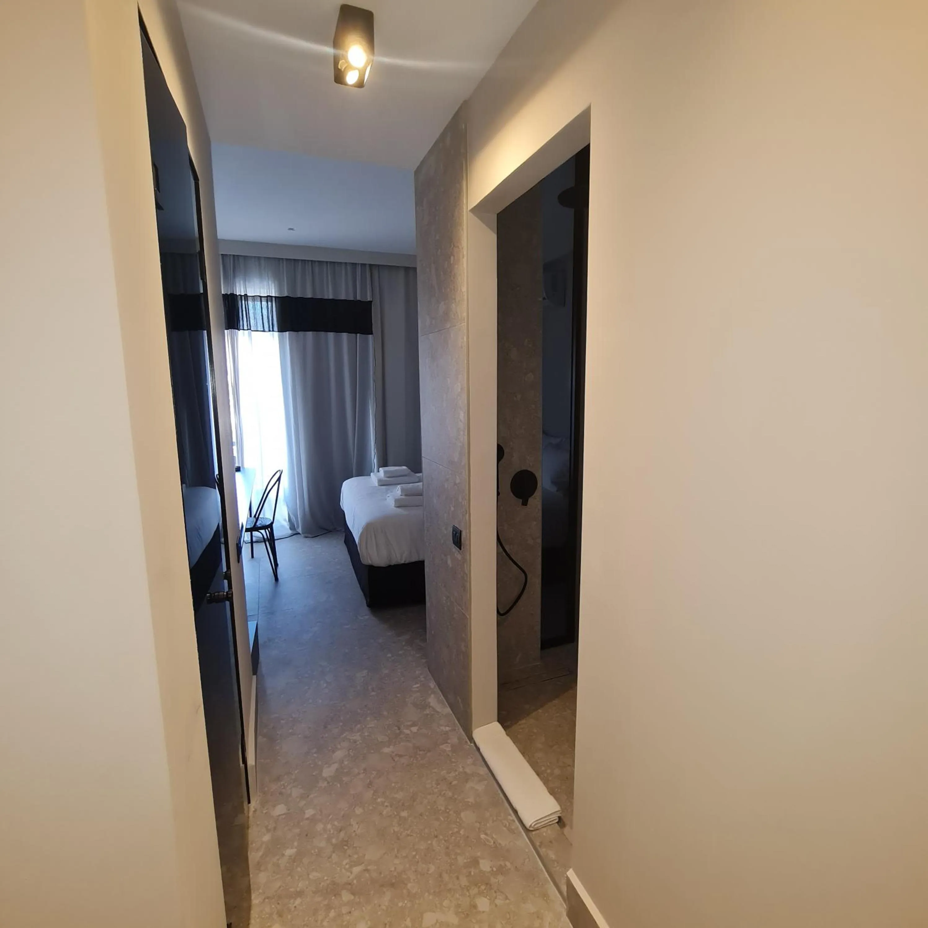 Photo of the whole room, Bed in Cityzoe Athens Suites