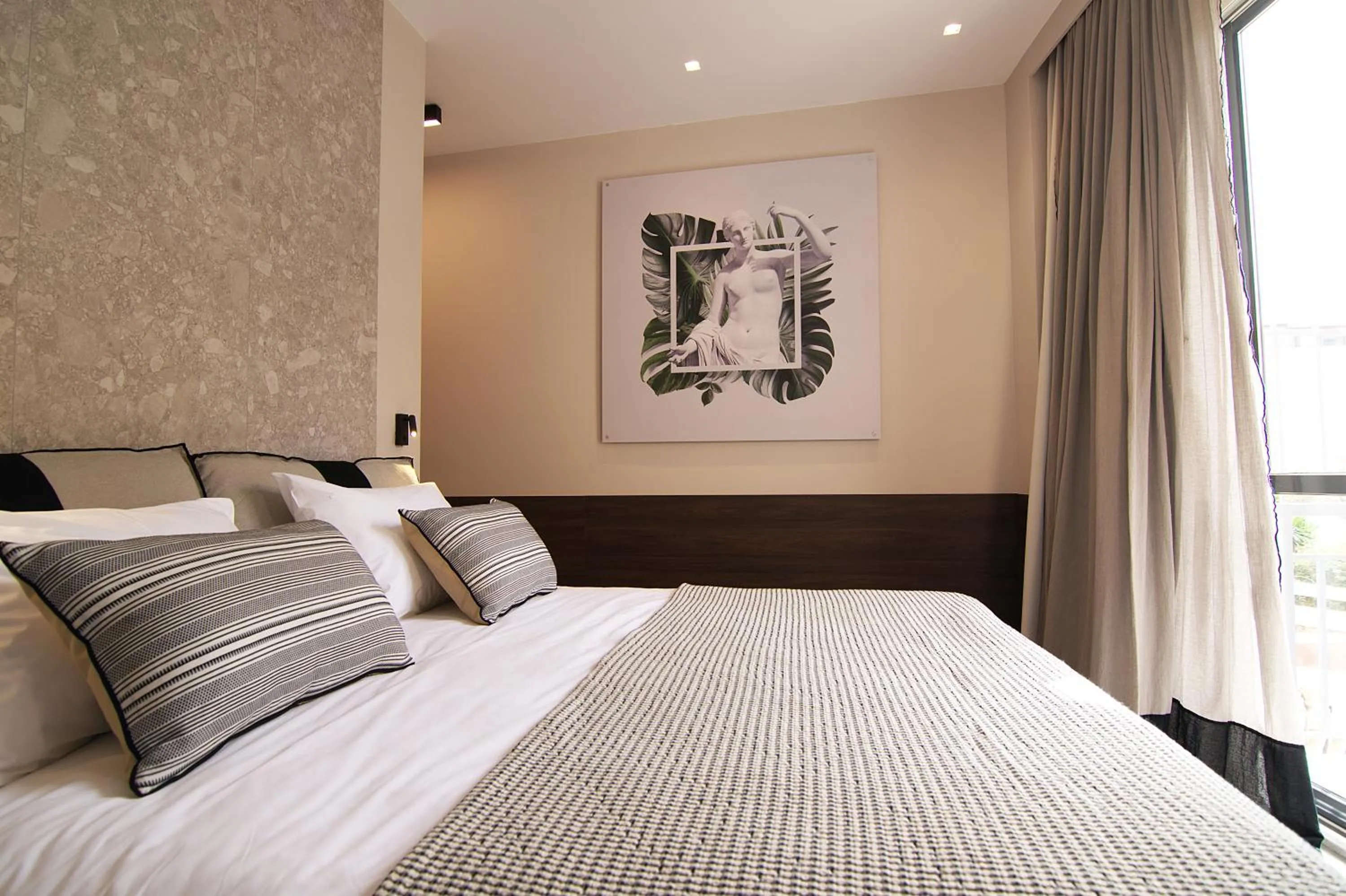 Photo of the whole room, Bed in Cityzoe Athens Suites