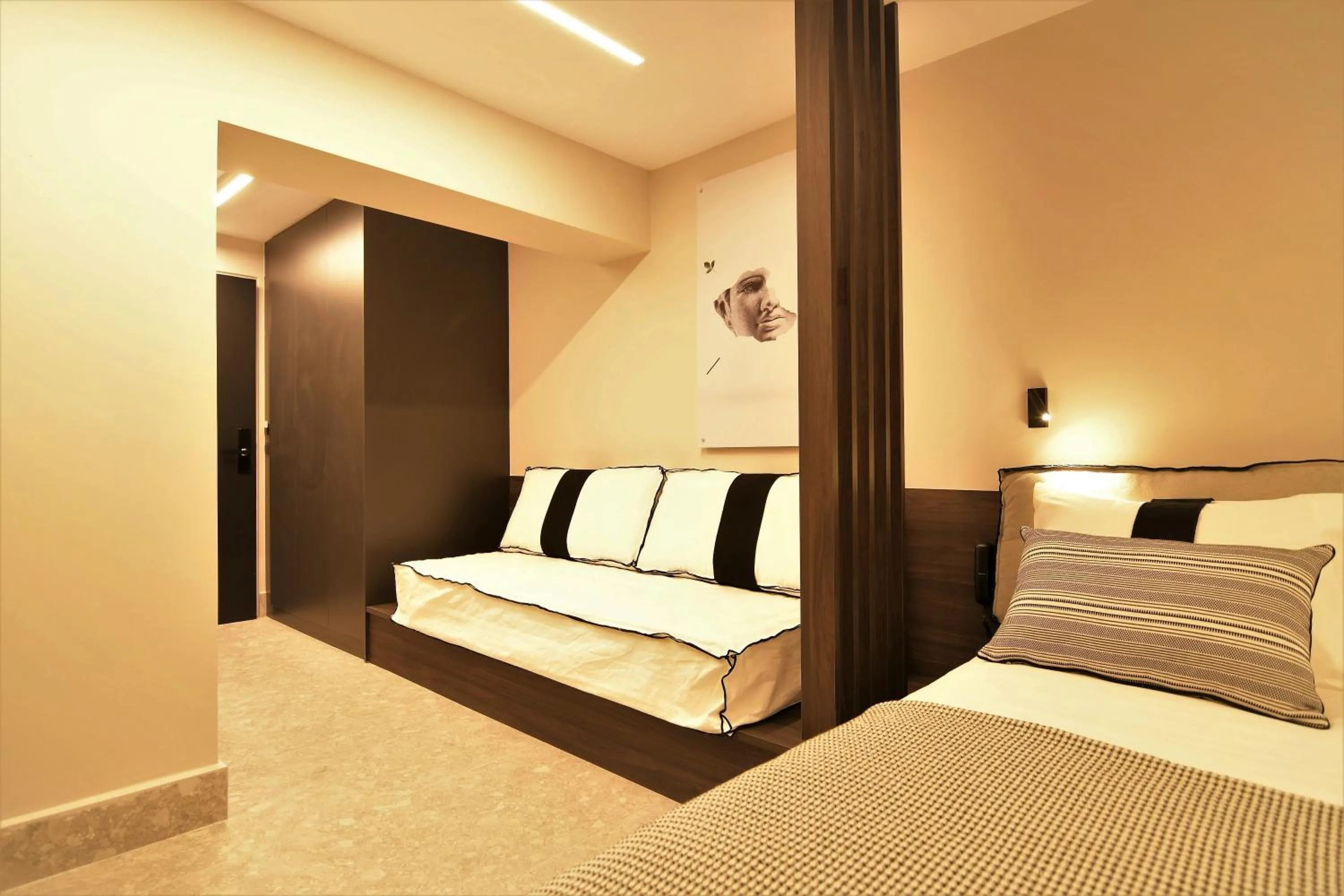 Photo of the whole room, Bed in Cityzoe Athens Suites