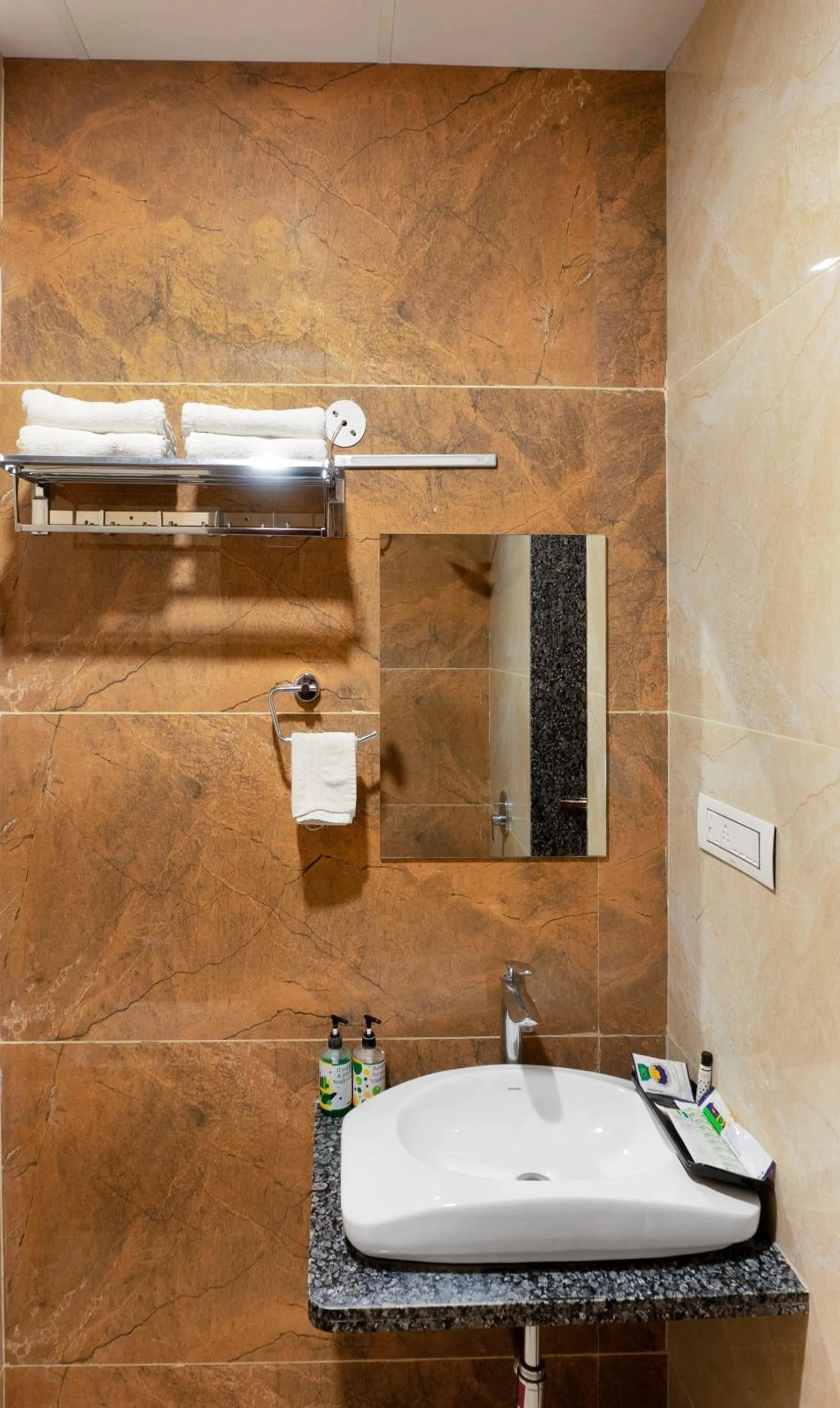 Bathroom in Treebo Premium Royal Amar With Mountain View and Swimming Pool