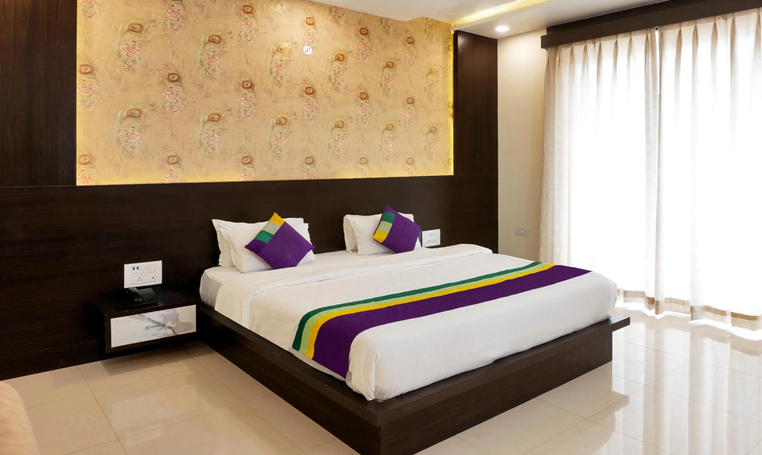 Bedroom, Bed in Treebo Premium Royal Amar With Mountain View and Swimming Pool