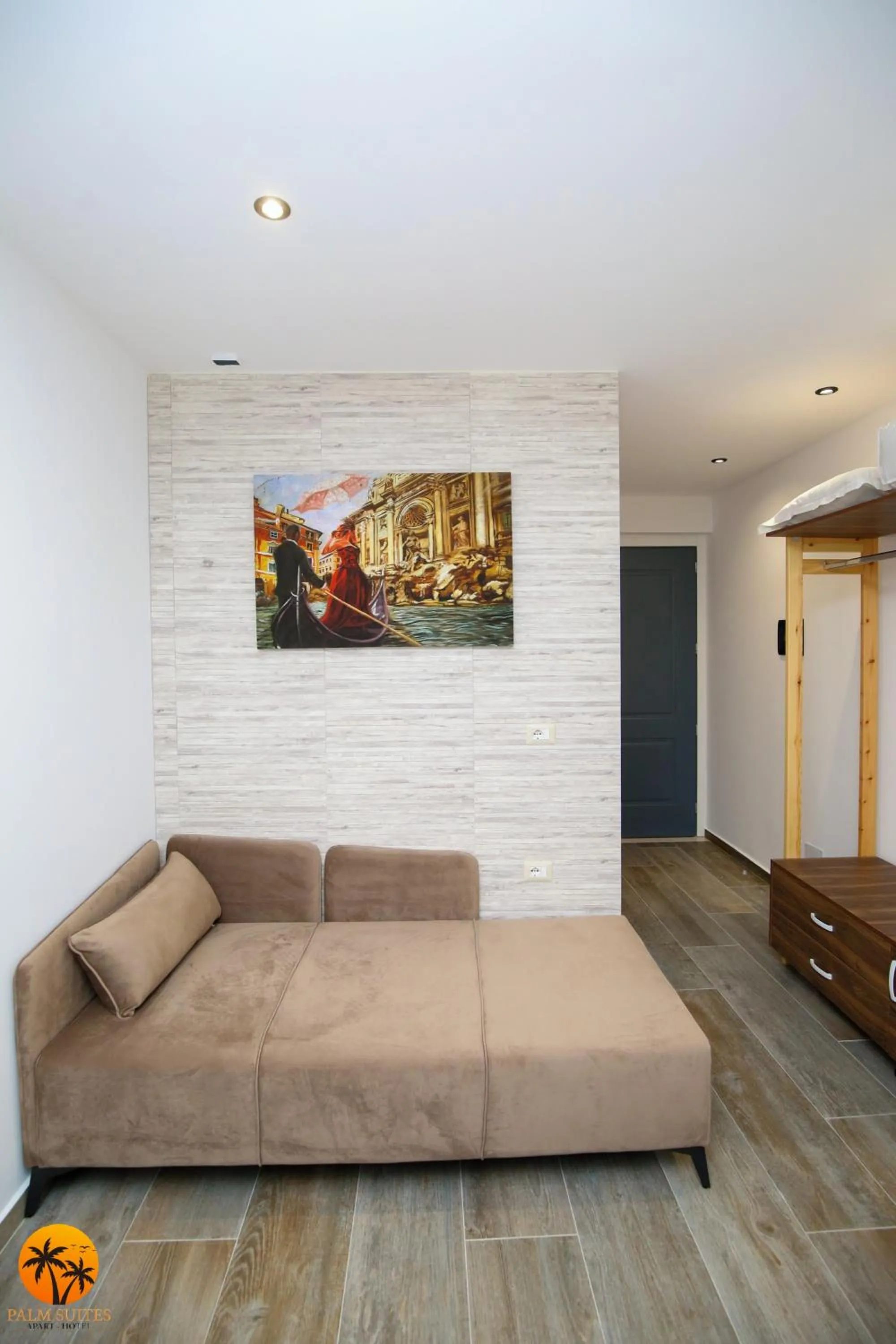 Bed in Palm Suites Apartment-Suite