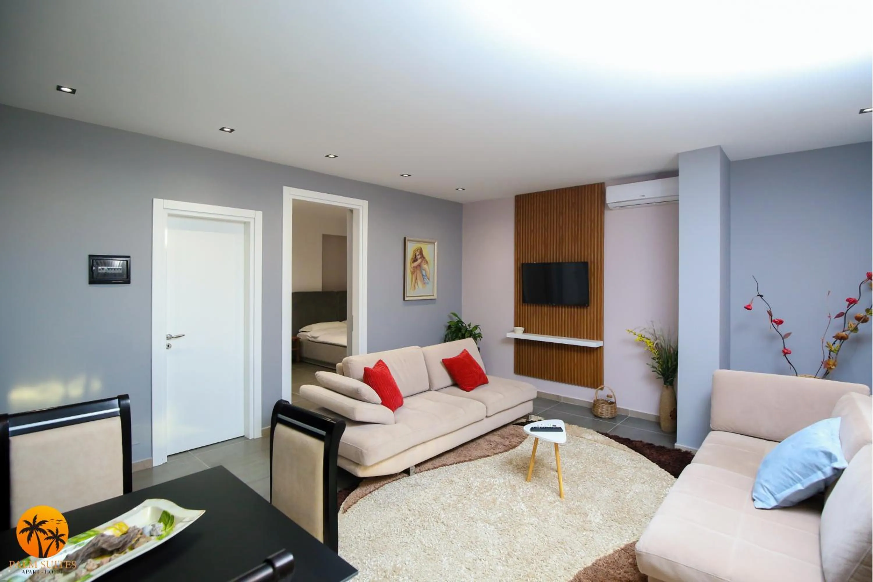 Living room in Palm Suites Apartment-Suite