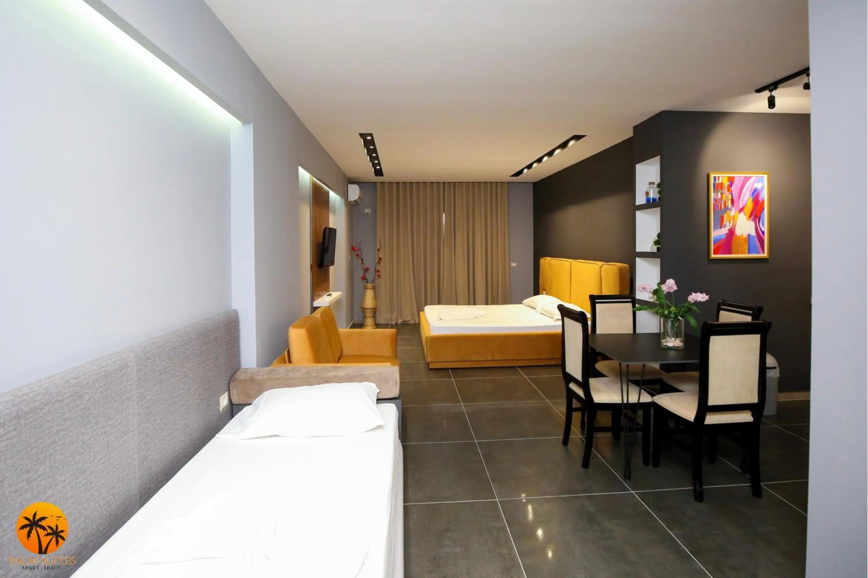 Bed in Palm Suites Apartment-Suite