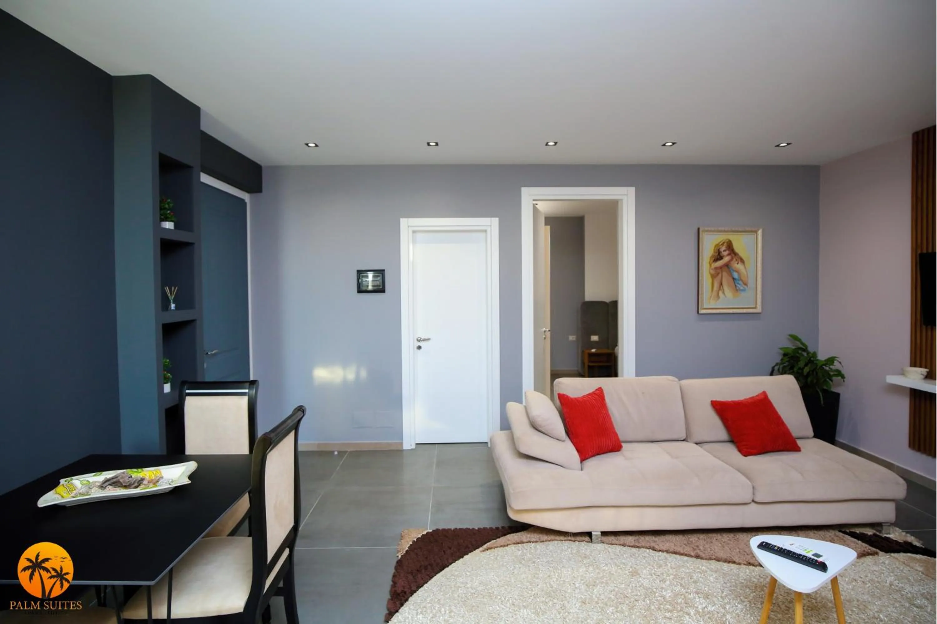 Living room in Palm Suites Apartment-Suite