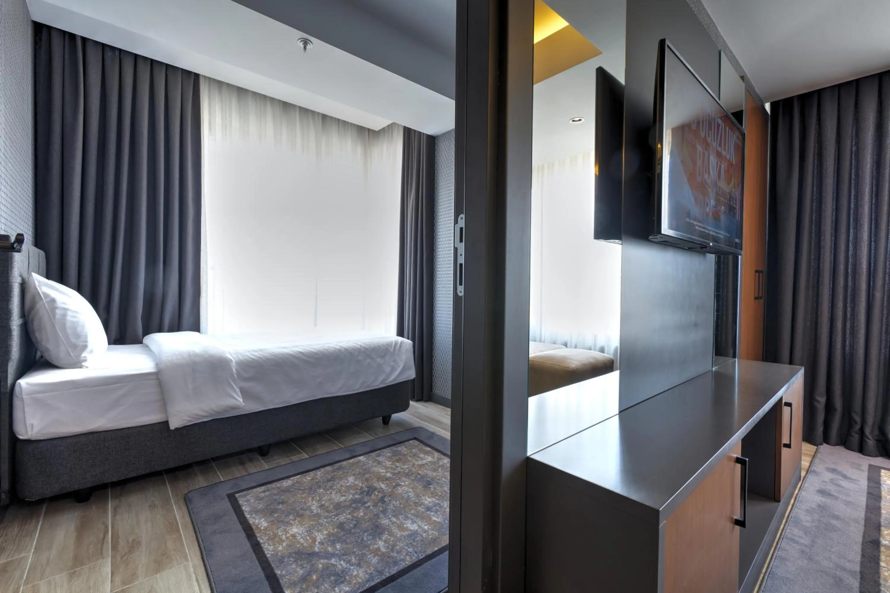 Bed in Nova Vista Deluxe & Suites a Member of Radisson Individuals