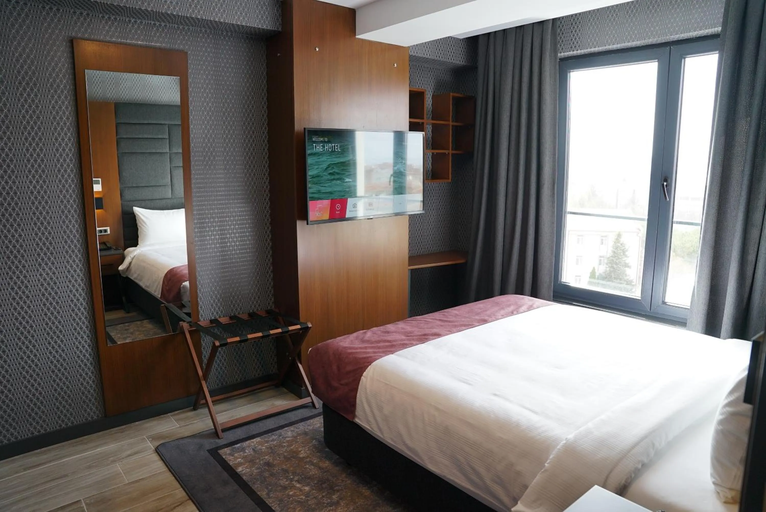 Bed in Nova Vista Deluxe & Suites a Member of Radisson Individuals