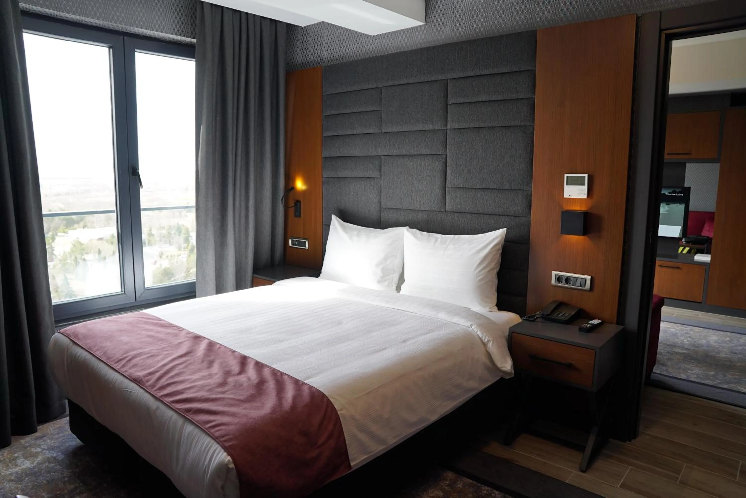 Bed in Nova Vista Deluxe & Suites a Member of Radisson Individuals