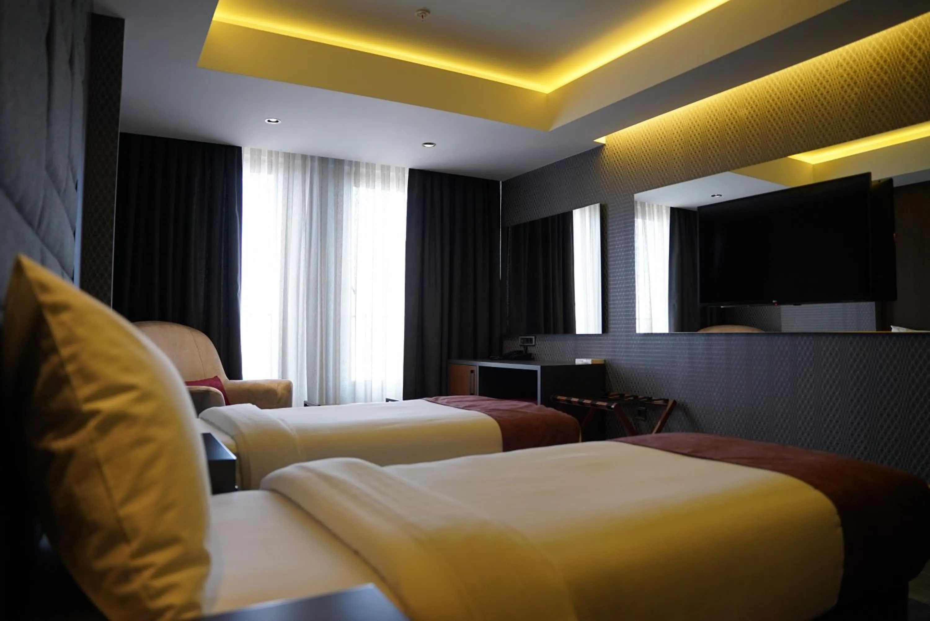 Bed in Nova Vista Deluxe & Suites a Member of Radisson Individuals