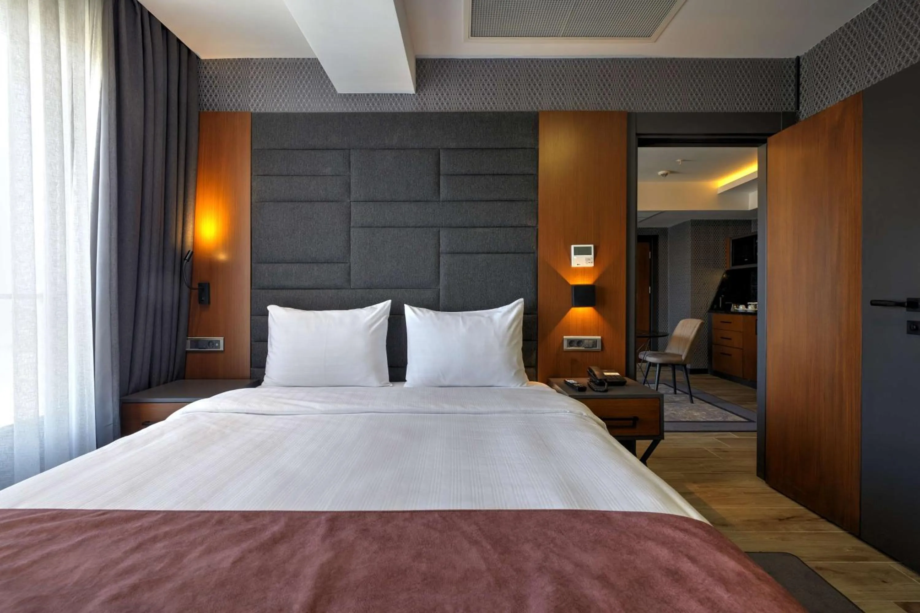 Photo of the whole room, Bed in Nova Vista Deluxe & Suites a Member of Radisson Individuals