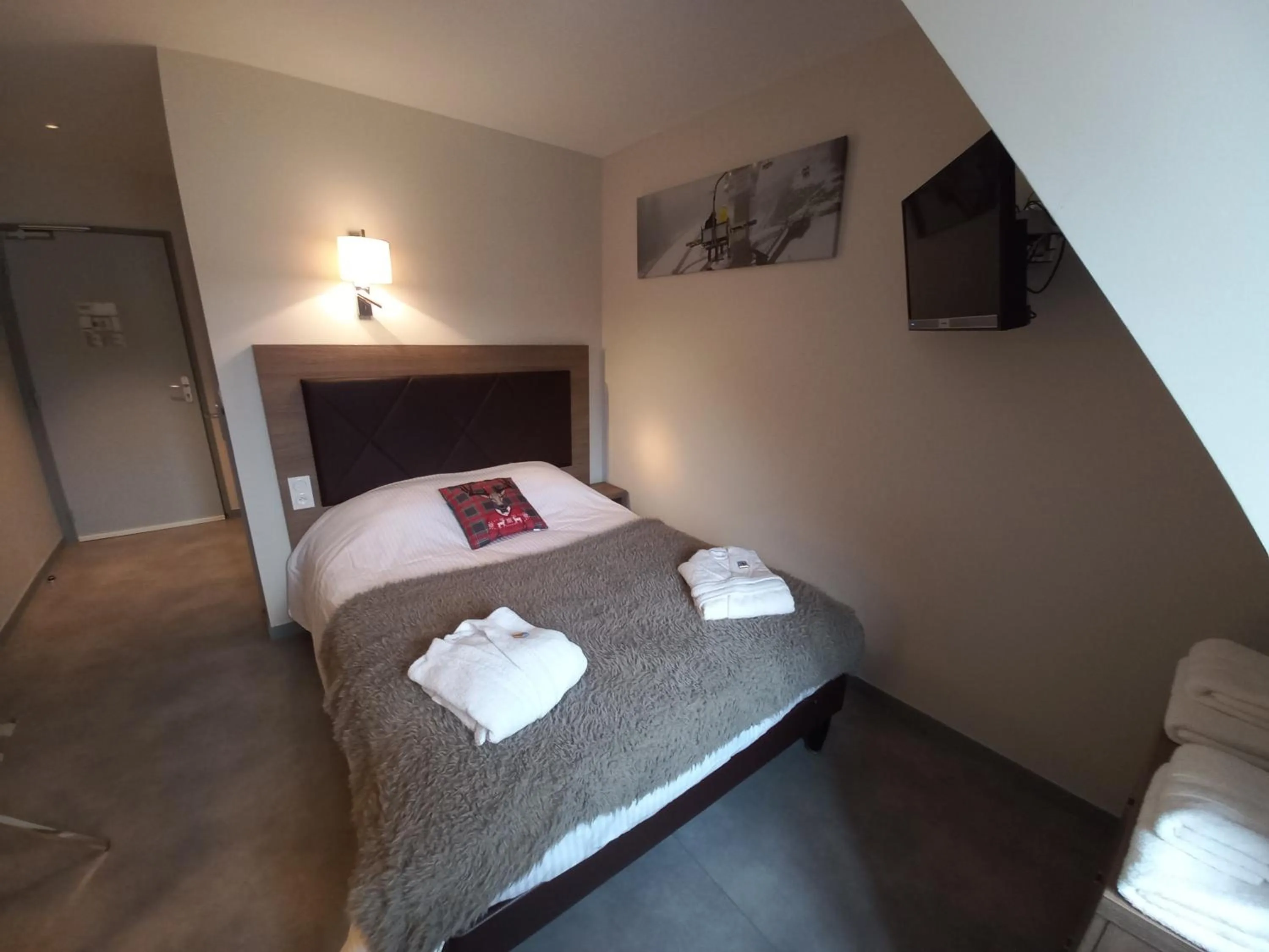 Bed in SARL DU PARC Hôtel Les Tremplins