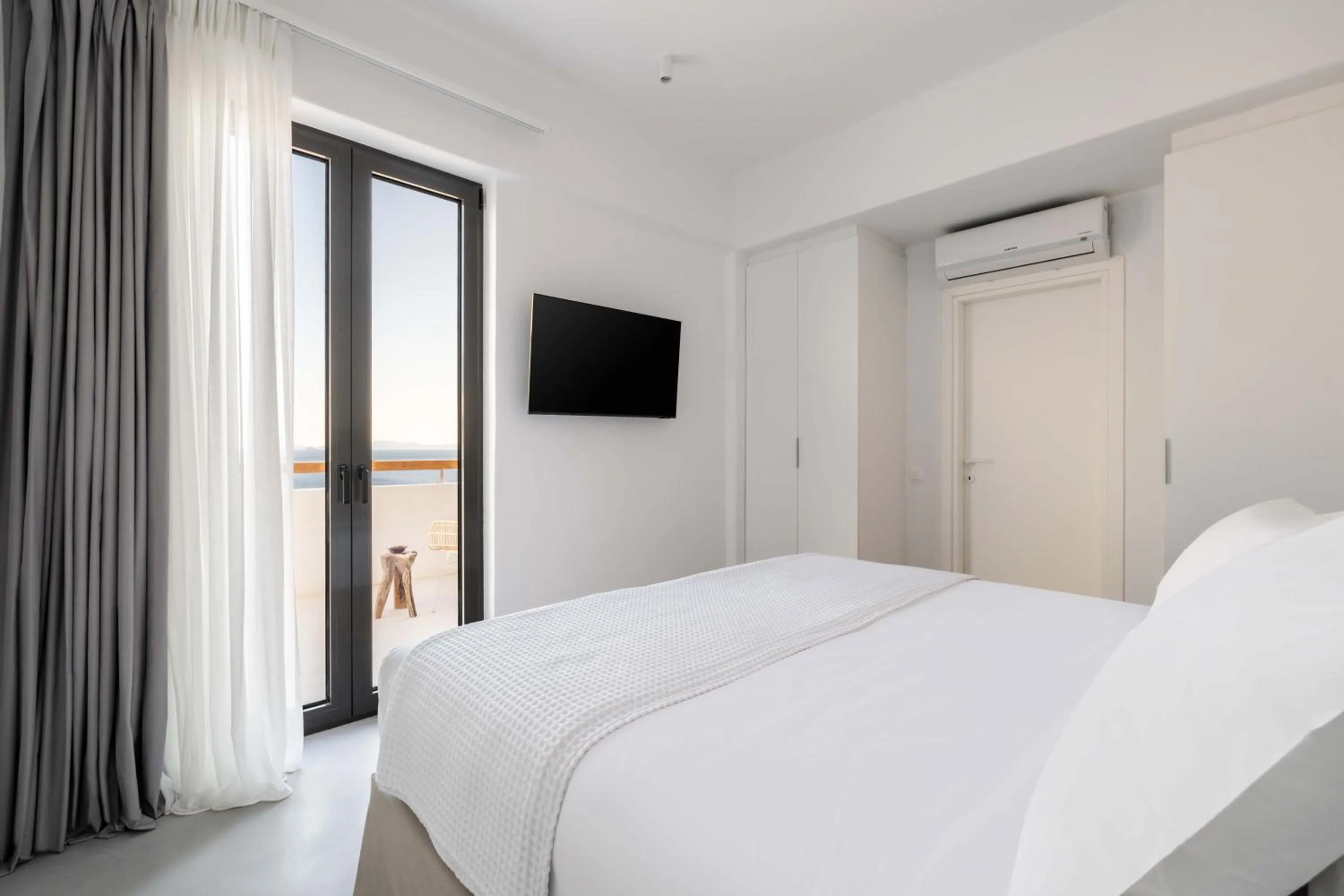 Bed in Aura Villas Tinos