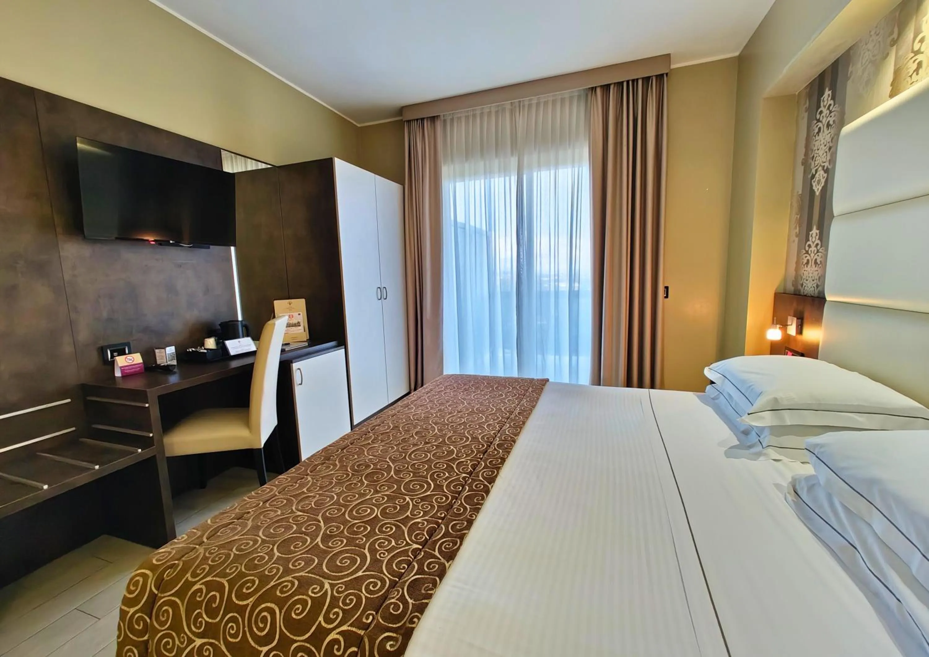 Bed in Hotel Pineta Palace