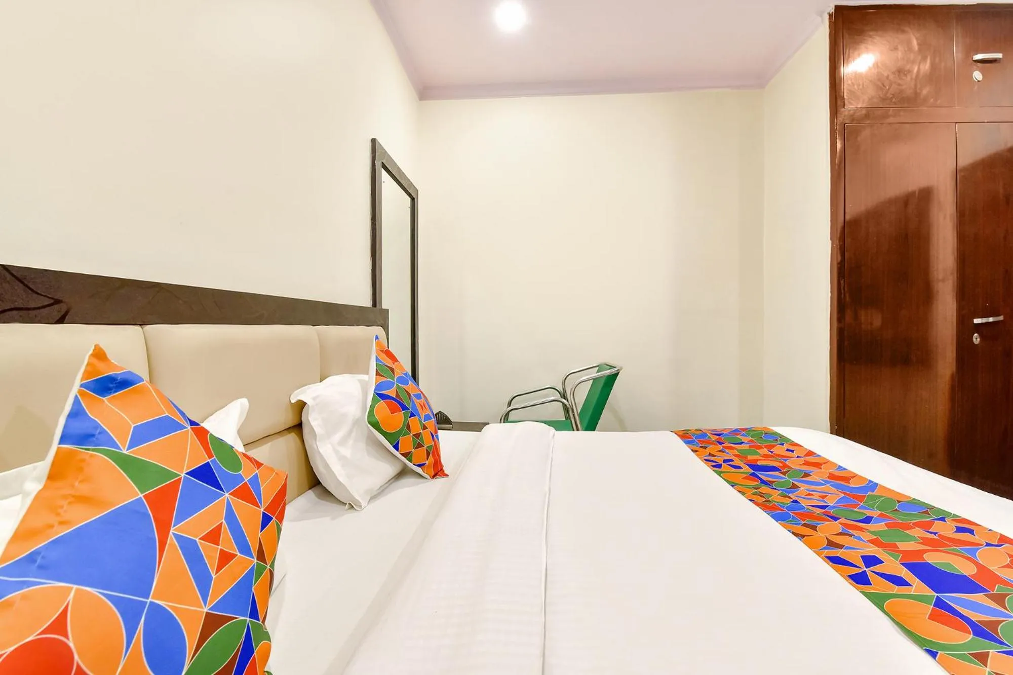 Bed in FabHotel Golden Leaf