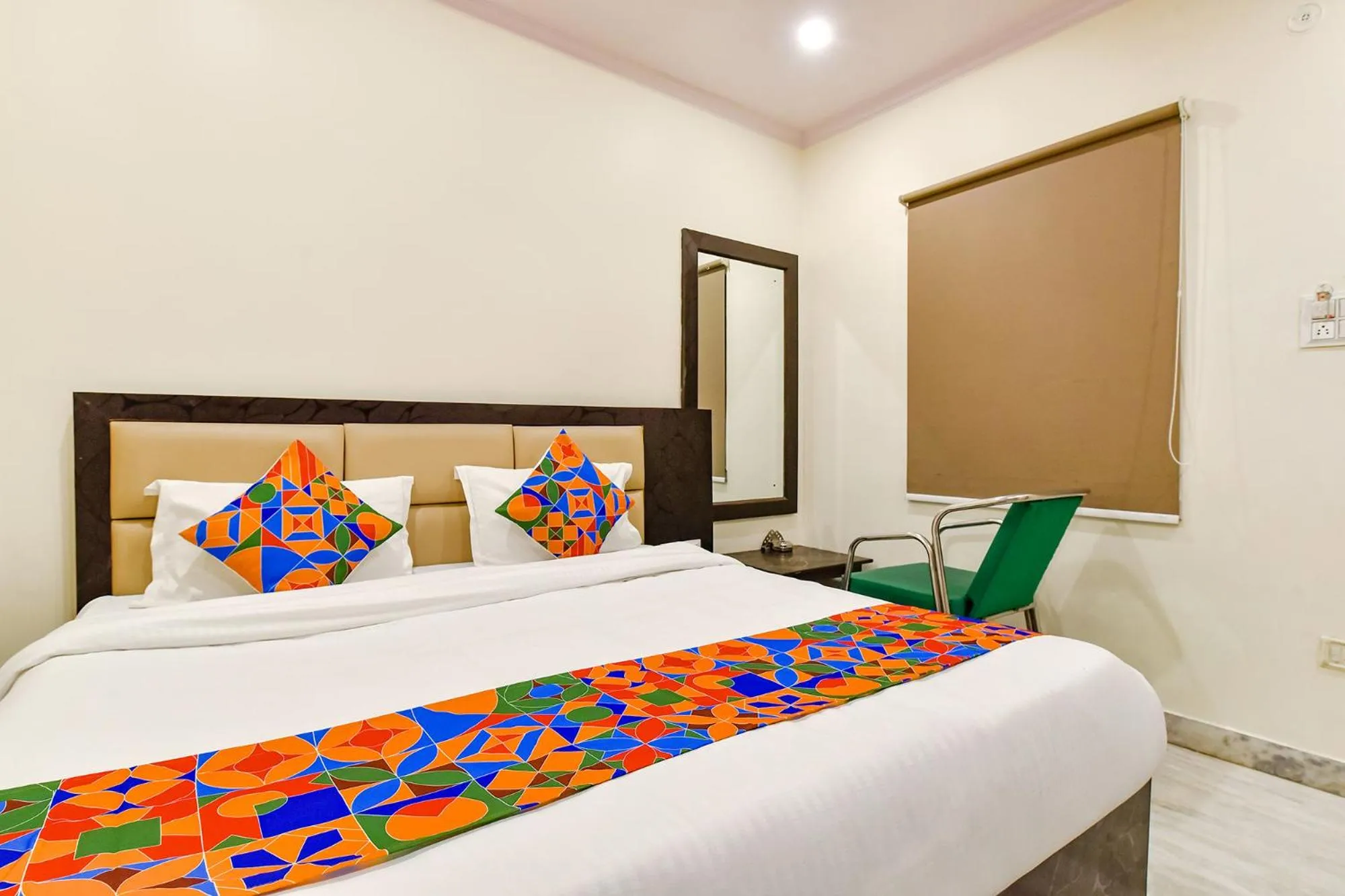 Bed in FabHotel Golden Leaf