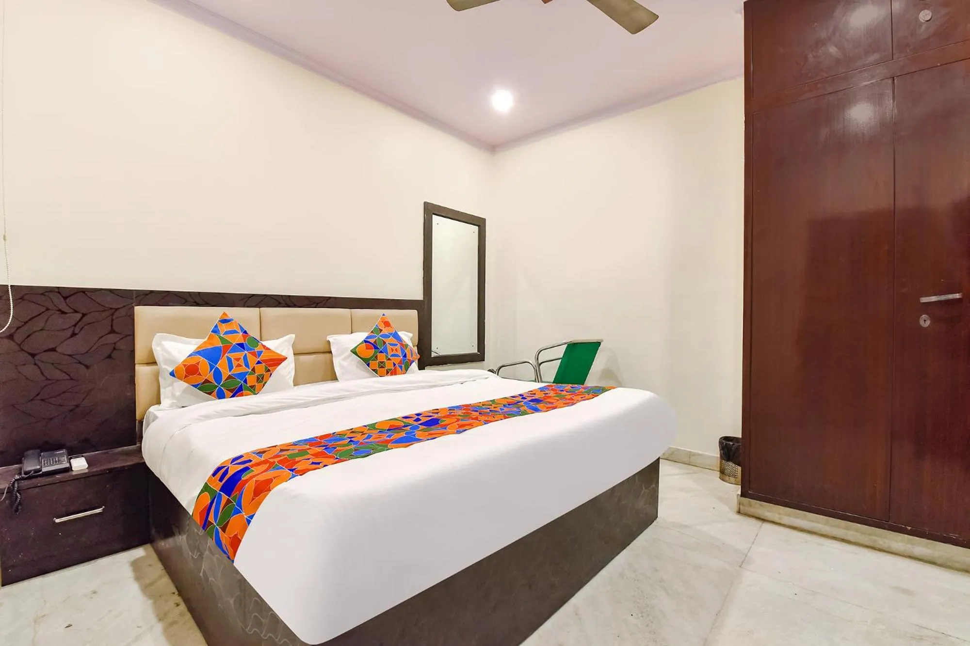 Bed in FabHotel Golden Leaf